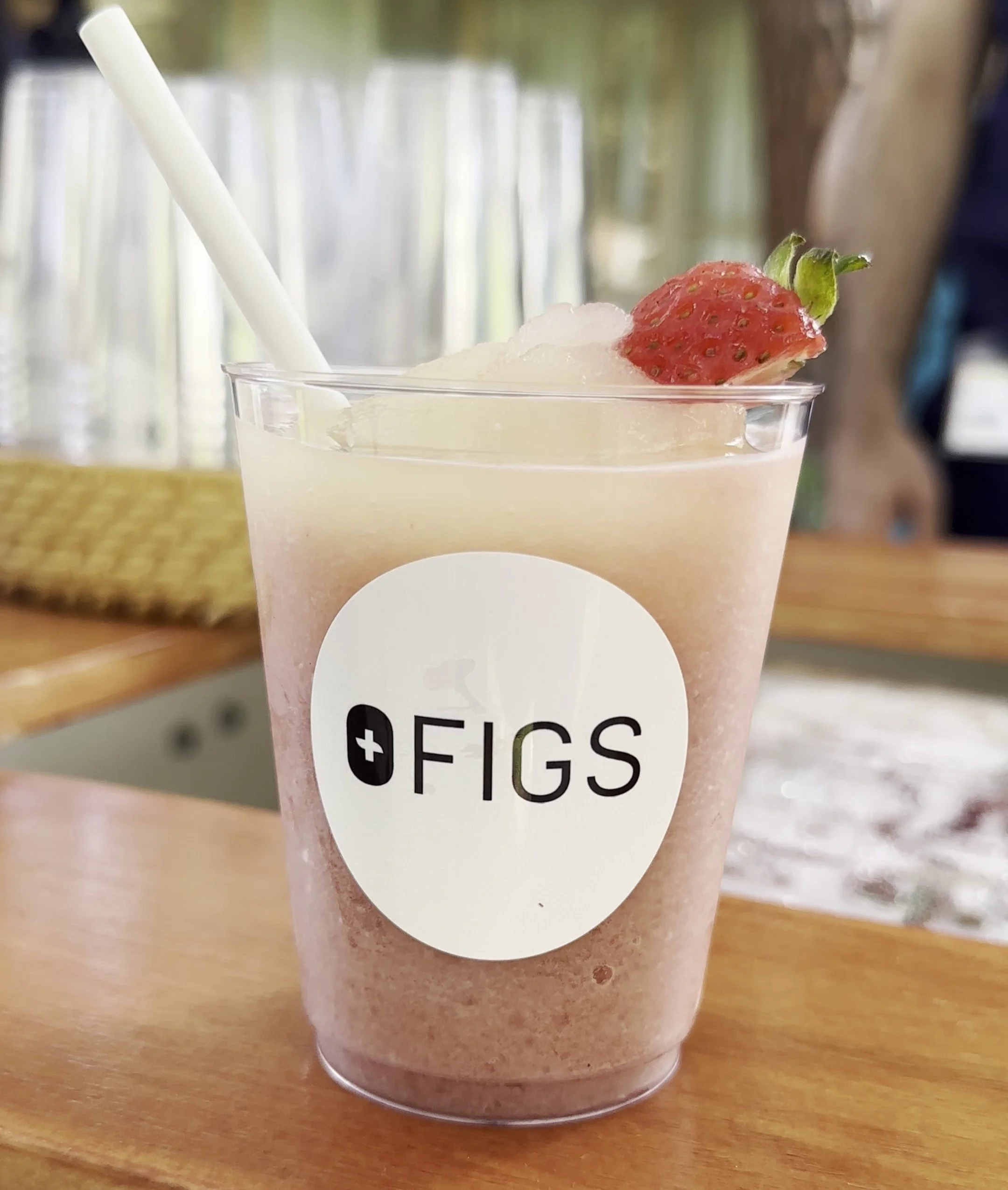 a slushy cup with a custom logo for FIGS brand event