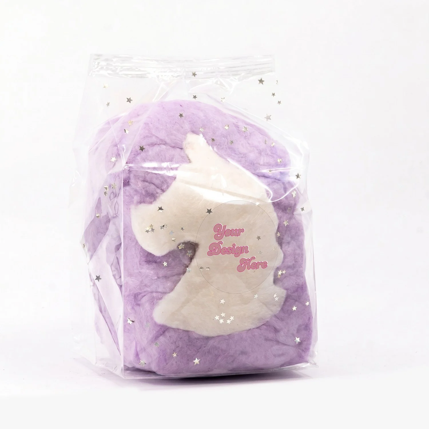 a unicorn cotton candy favor bag with edible glitter and a custom label