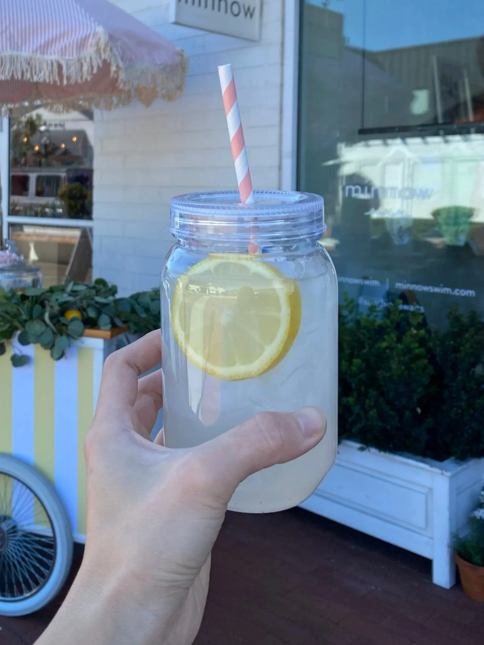 lemonade in a custom plastic mason jar with striped straw for minnow @ Lido Village