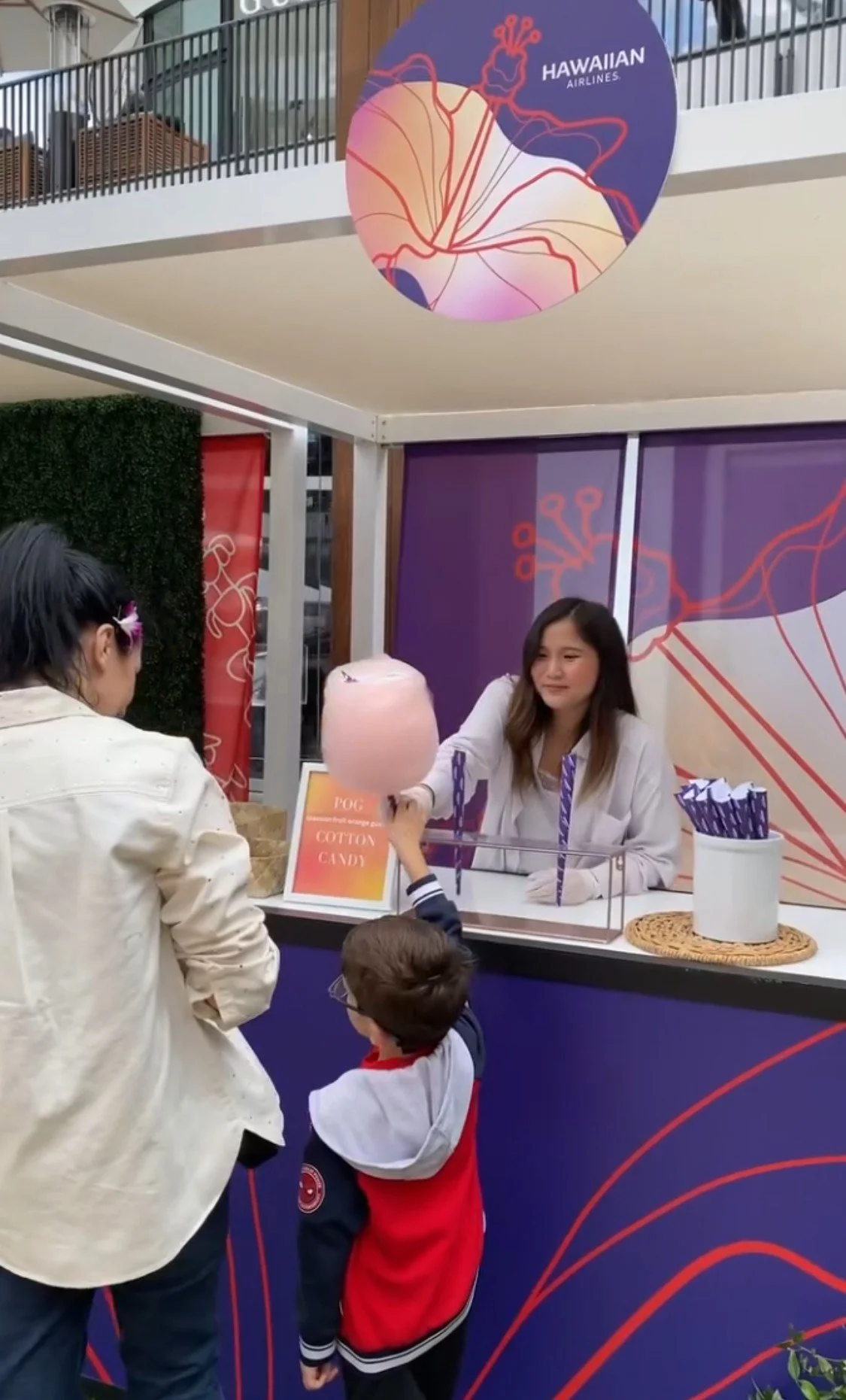 Custom POG-flavor cotton candy with a Hawaiian Airlines airplane topper at Westfield Century City