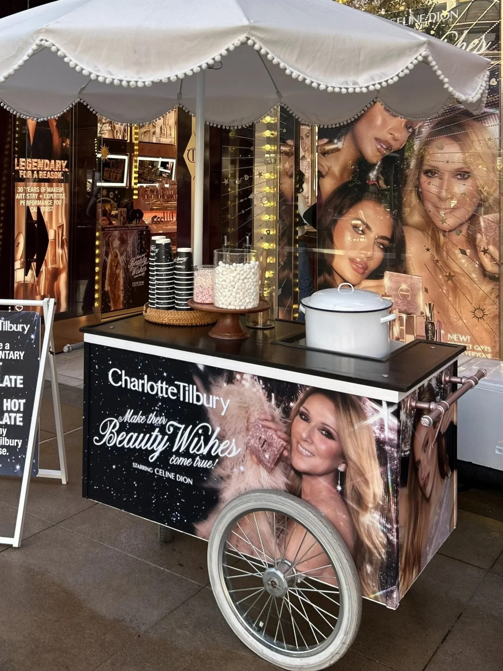 hot chocolate cart with three-sided full-color brand wrap for a beauty brand activation