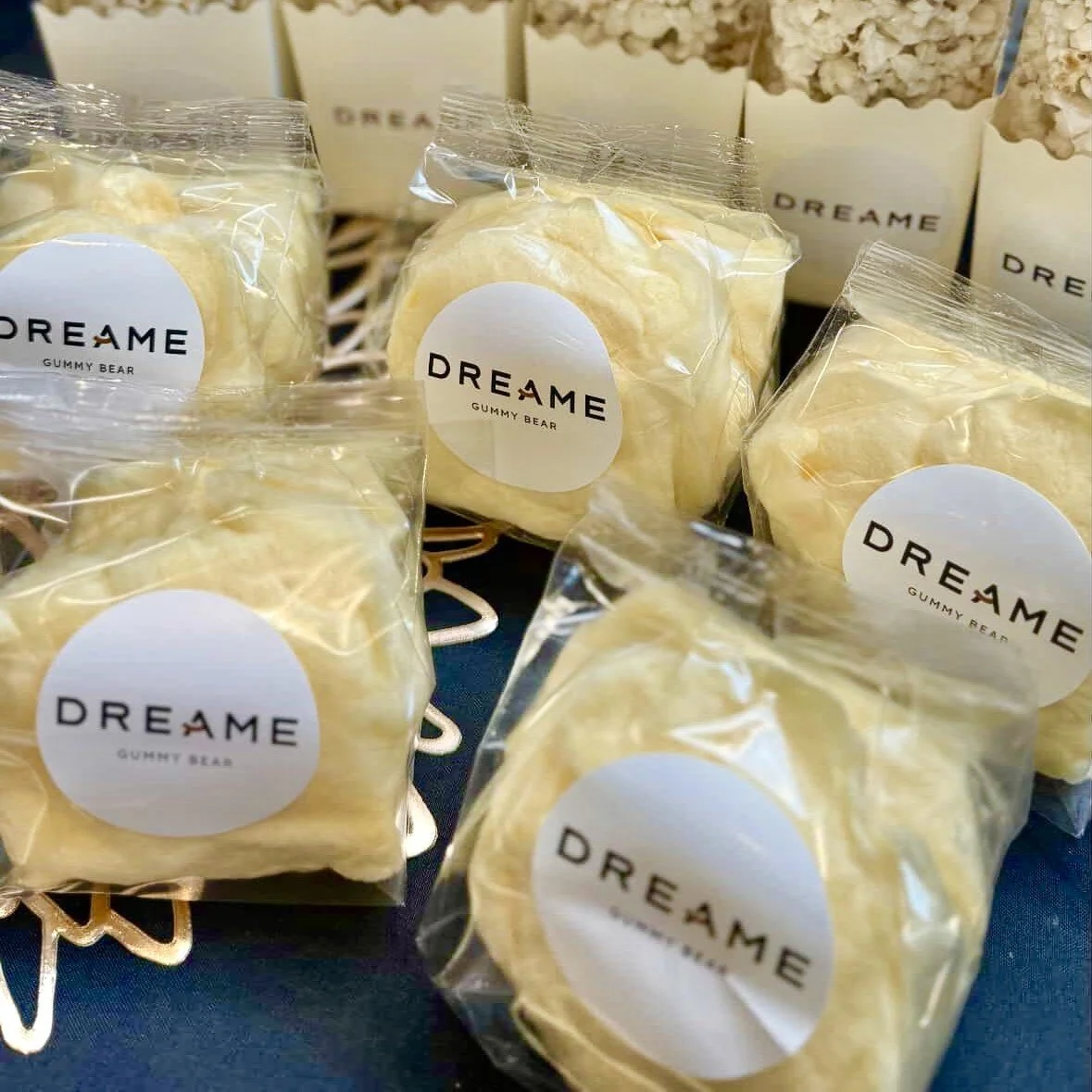 custom branded cotton candy favors for a dreame product launch event
