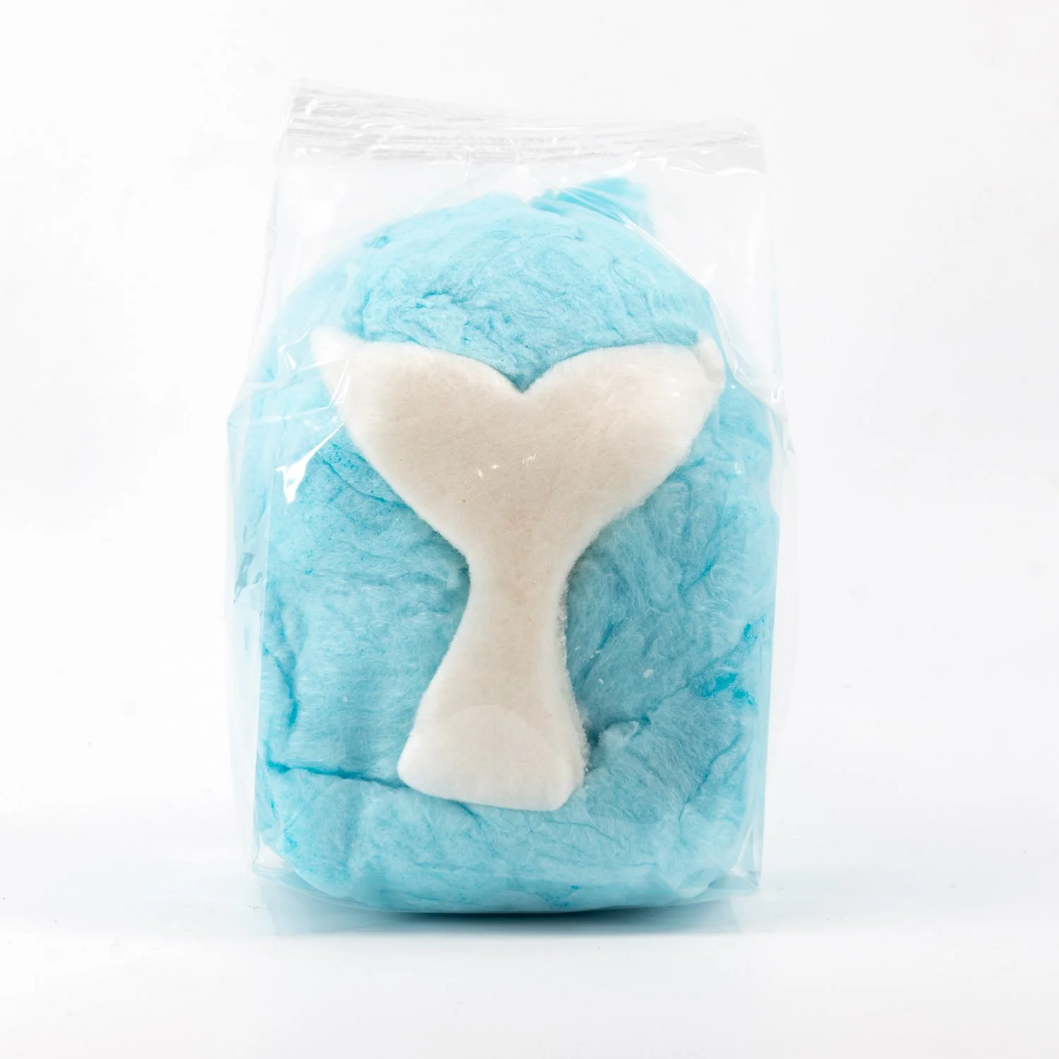 a blue cotton candy favor bag with an edible mermaid tail