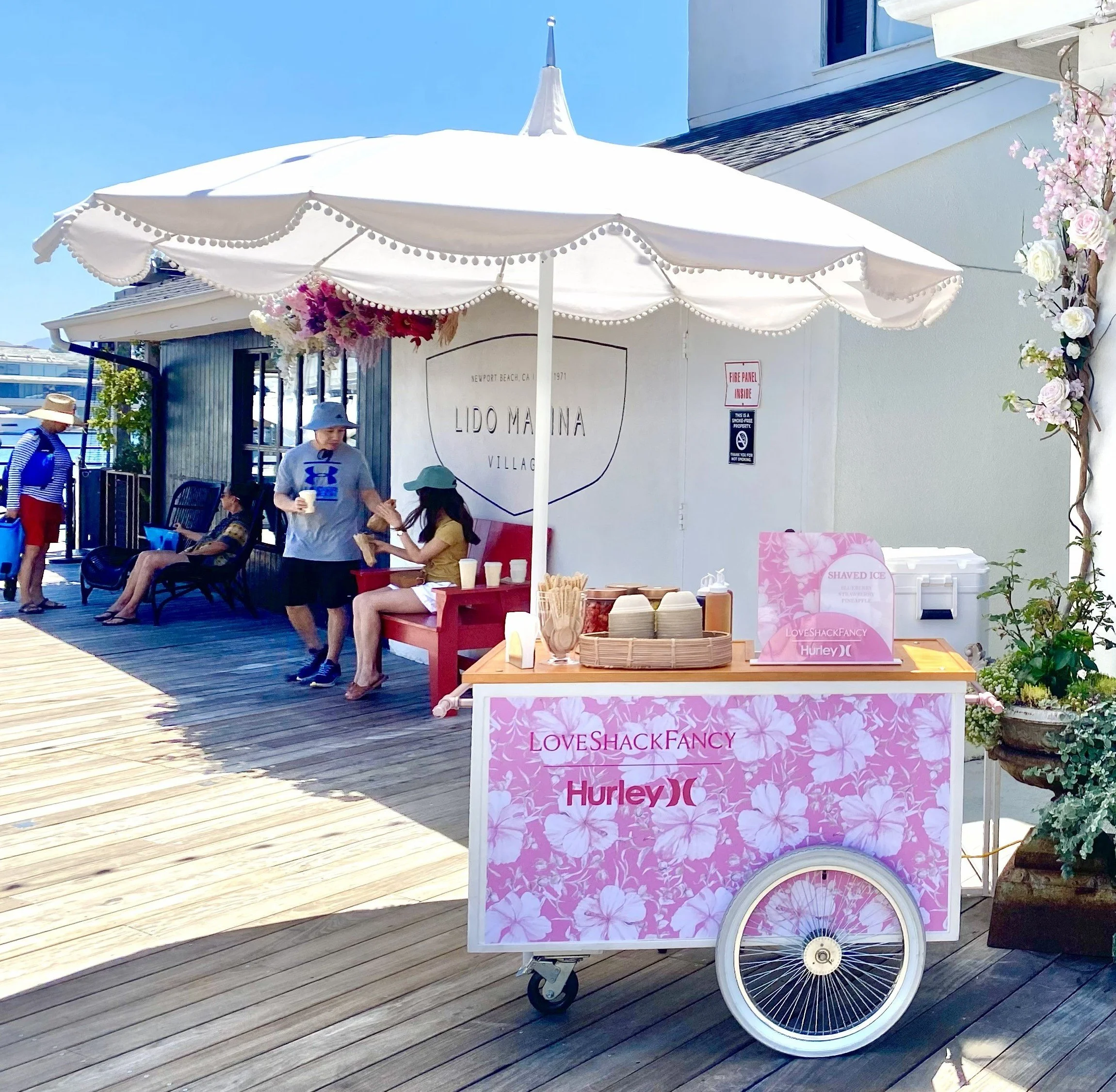 the jolly sheep shaved ice cart at a loveshackfancy brand activation