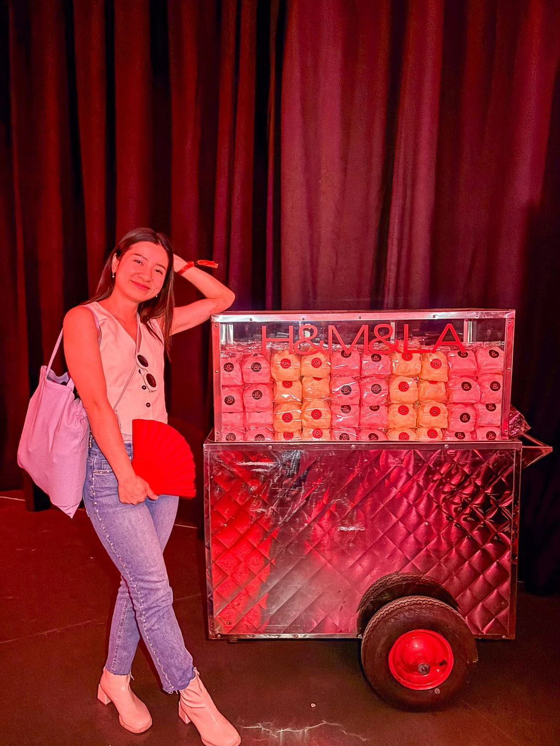 LA-style fruit cart displaying packaged cotton candy in the arcade throwback room at the H&M&LA Festival