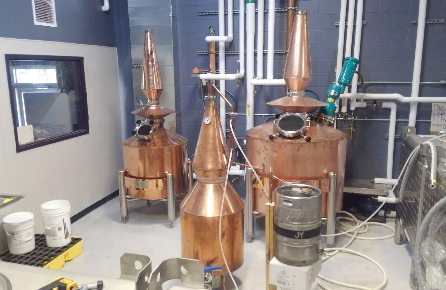 Looking back 9 years. We distilled the first batch of sugar beet spirit on the 50-gallon still just days before opening, so we could have some booze for a Grand Opening Party. 

HK was off rafting the Grand Canyon for his honeymoon. The big fermentat