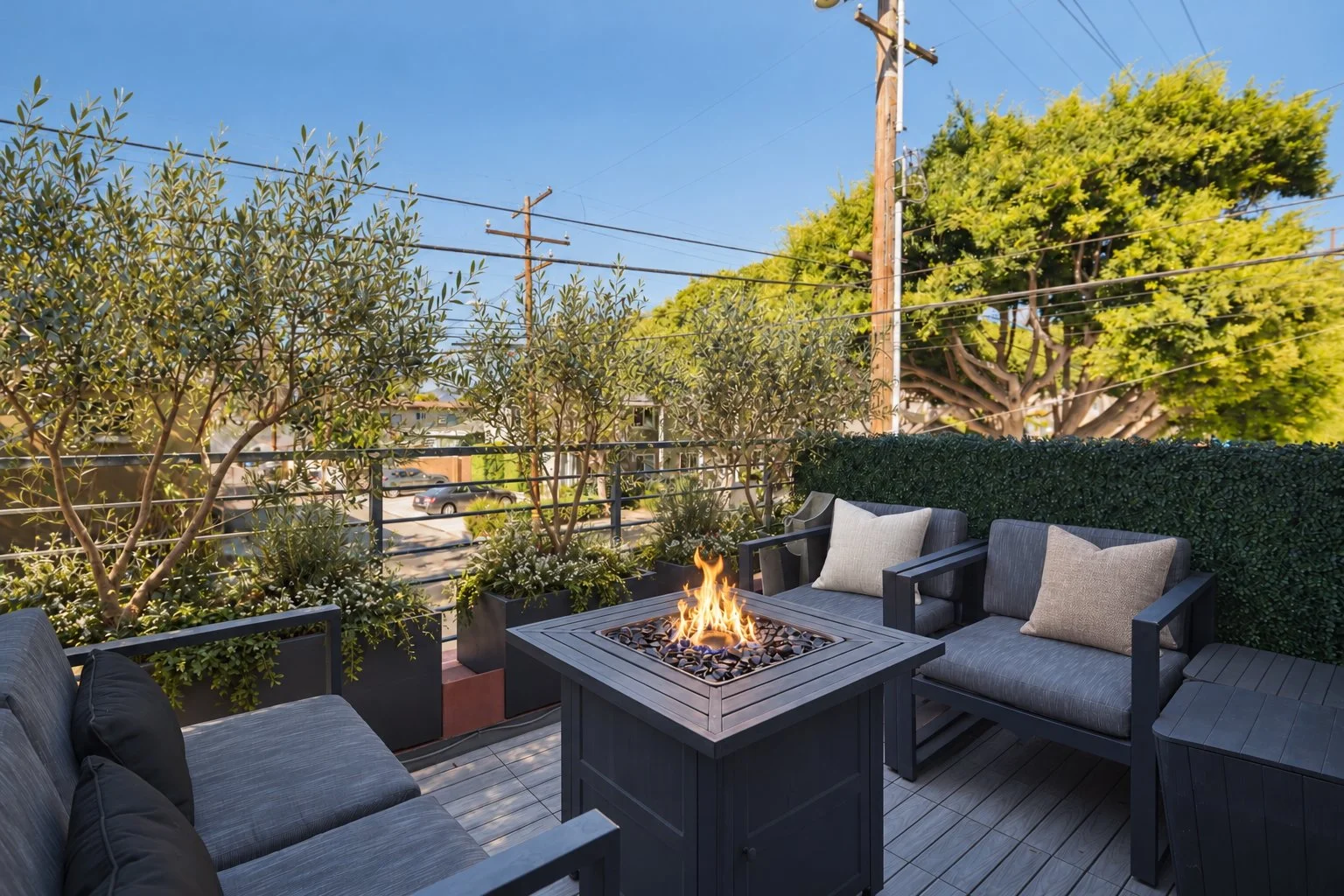 Neutral pillows on sunlit patio chairs.jpg