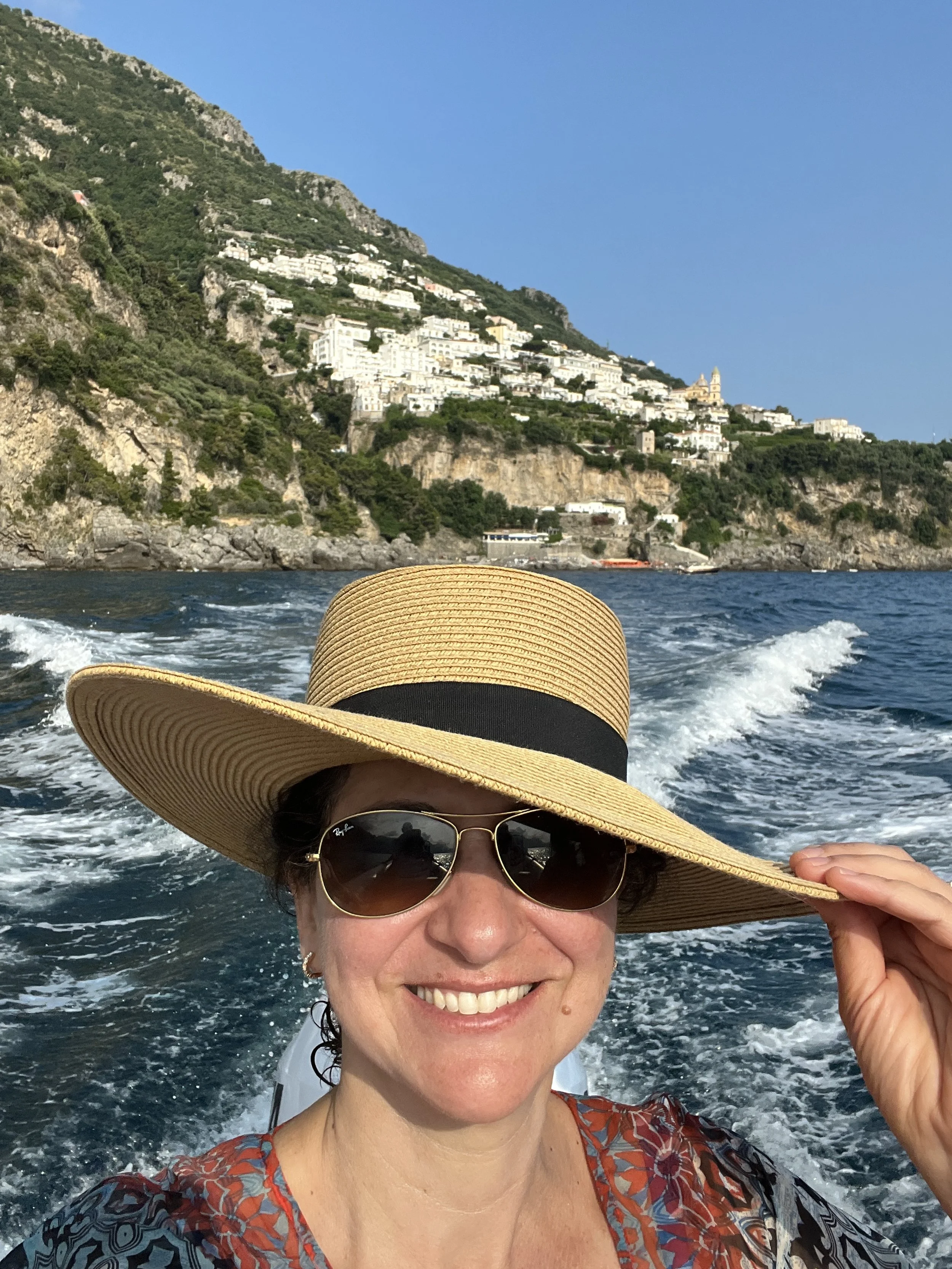 Chef Debbie on a boat in Positano, Italy.JPG