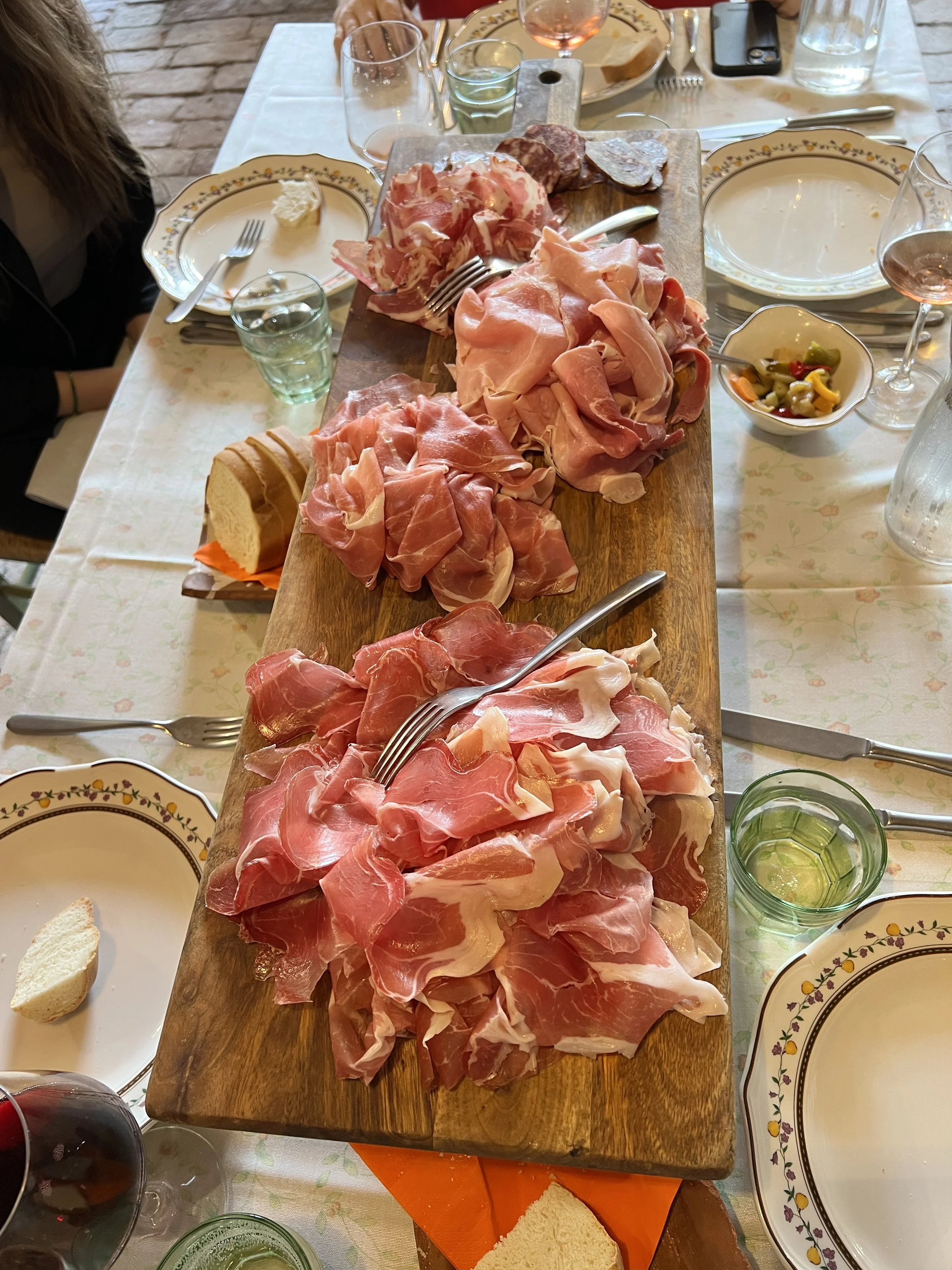 Charcuterie board in Parma, Italy during a culinary retreat.JPG
