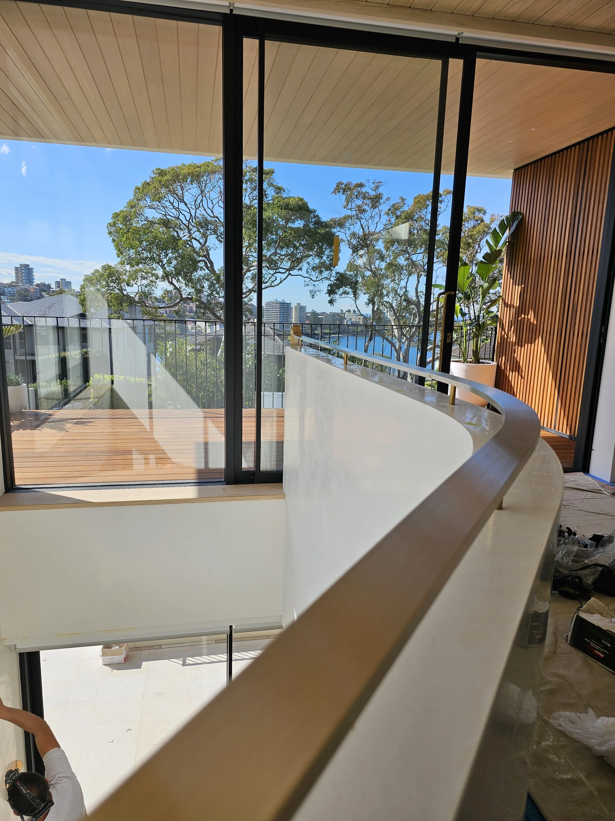 Curved brass handrail