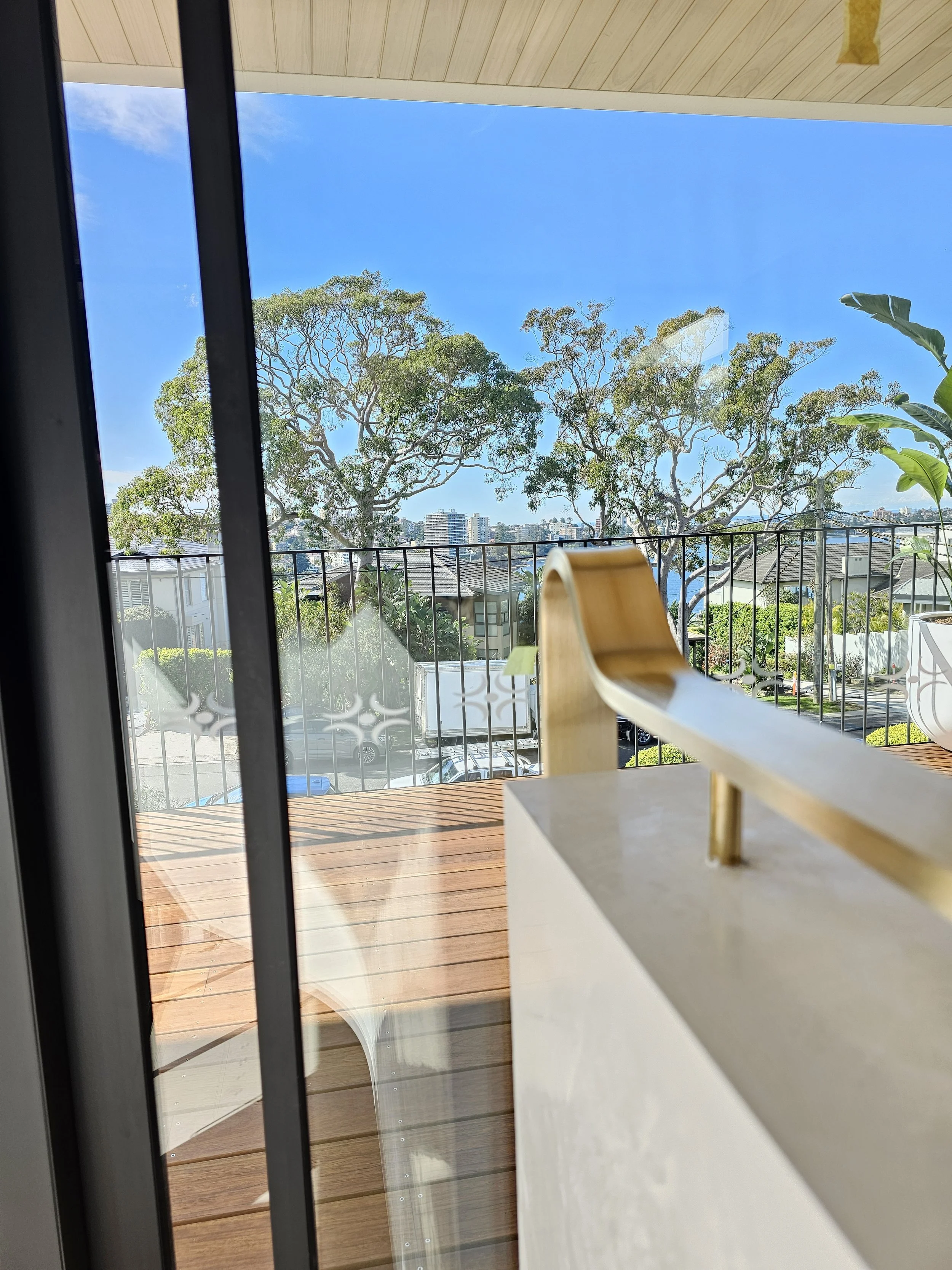 Custom curved brass handrail