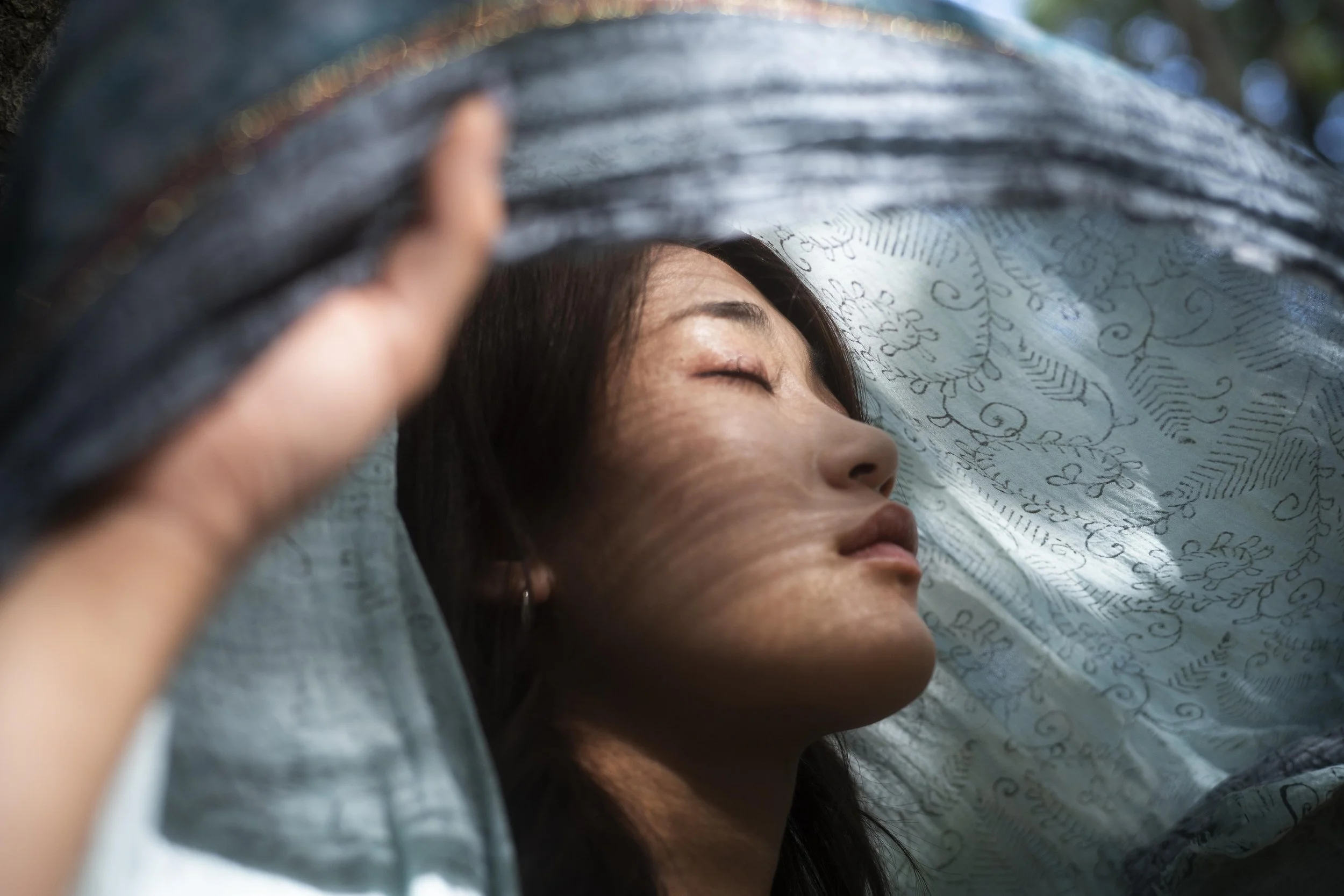 Woman with eyes closed processing feelings