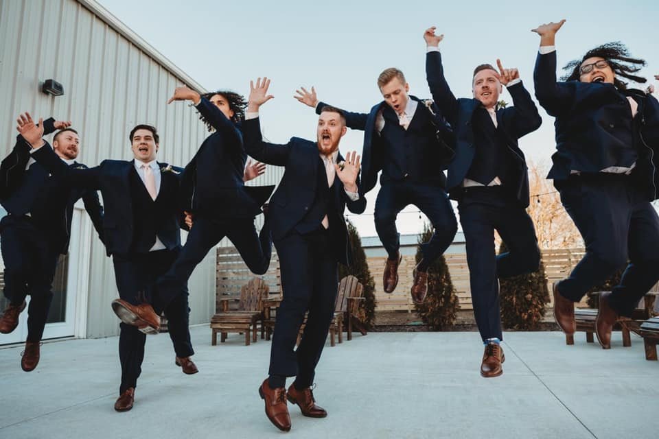 jumping for joy at The Steel Barn Event Center.jpg