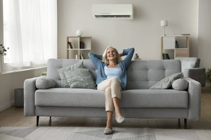 woman relaxing on sofa
