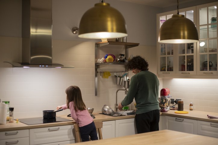 family washing dishes