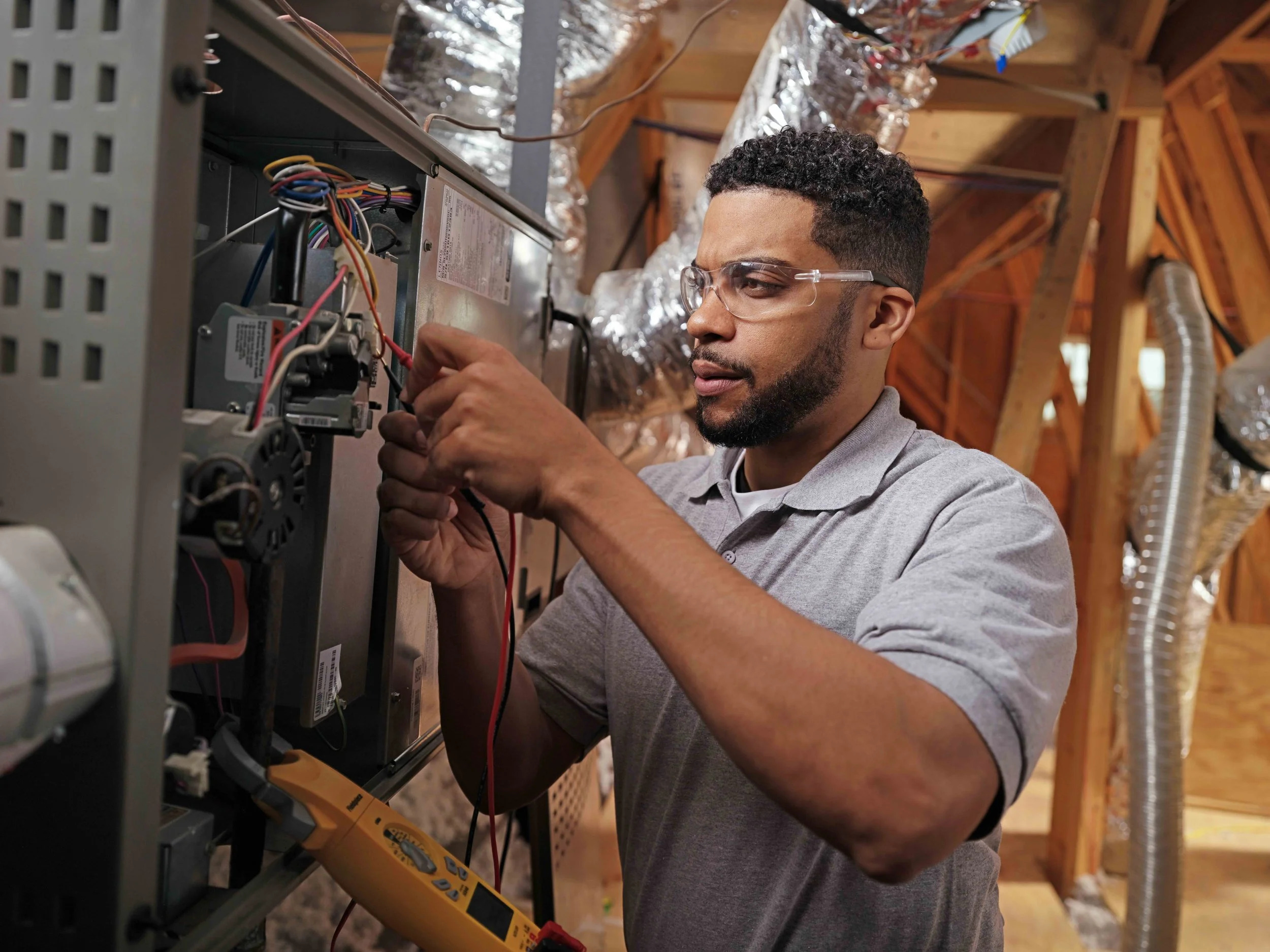 Technician installing a furnace