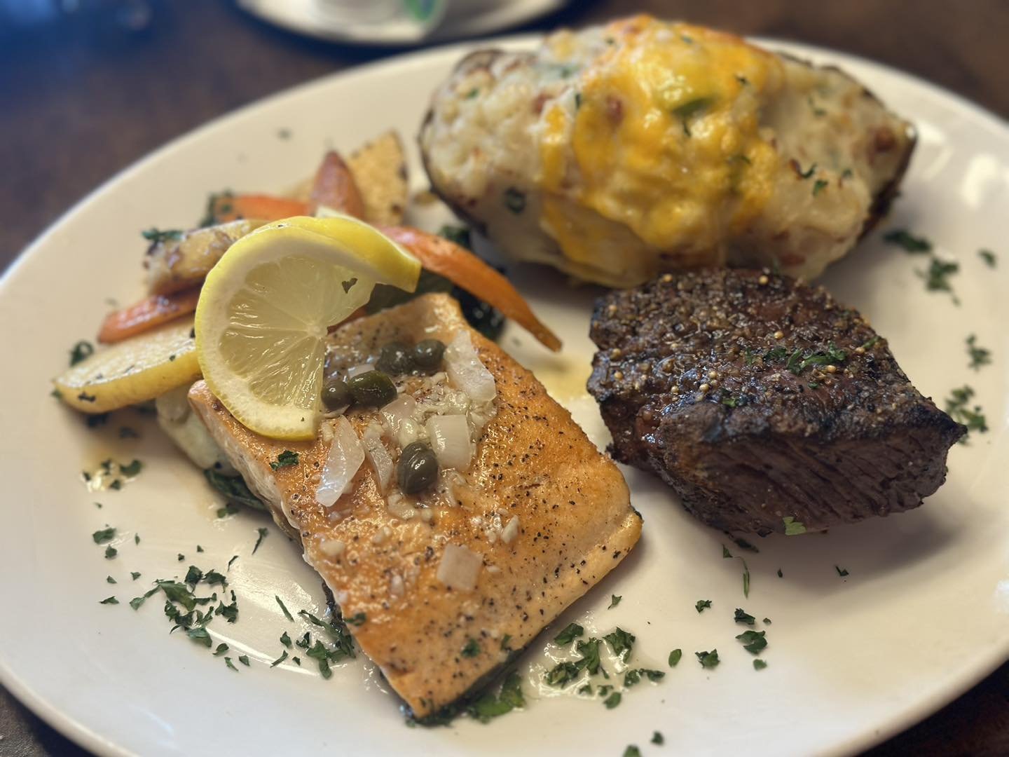 Special treat for Tonight!  Our Northern Surf and Turf! 

Baked Arctic Char with a lemon caper dill sauce and a baseball cut of our Buffalo Sirloin! 

Savour our taste of the North!