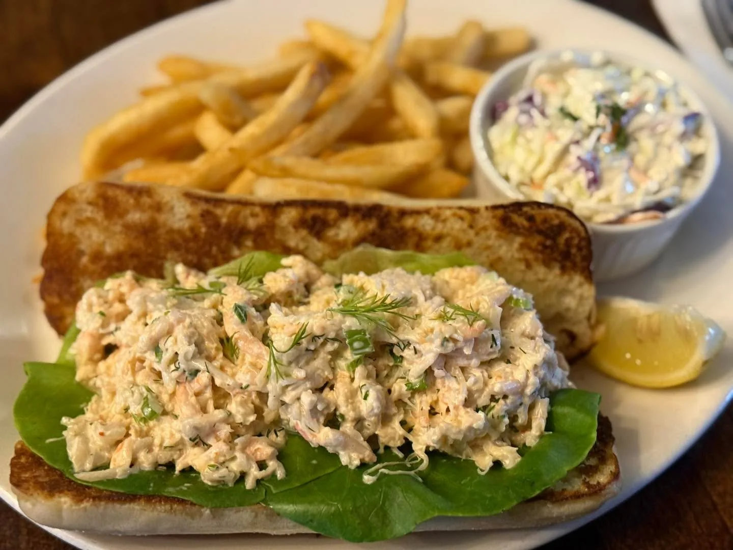 Seafood Lobster Roll with slaw and fries! 

Available as our Lunch Feature! 

11-2 pm