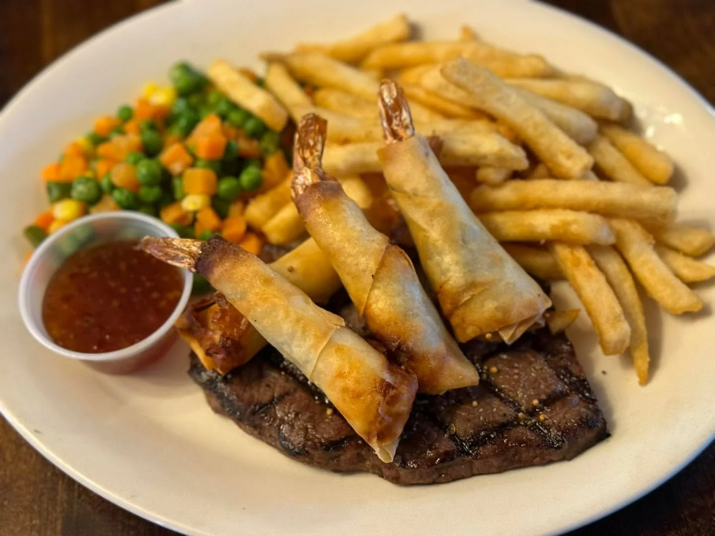 Have you tried our Firecracker Shrimp yet?  If not,  today you can with our Friday Surf &amp; Turf Luncheon. 

4 jumbo Firecracker Shrimp with a 6 oz Certified Angus Strip loin. 

Available 11-3 pm or while supplies lasts! 

Come join us for an unfor