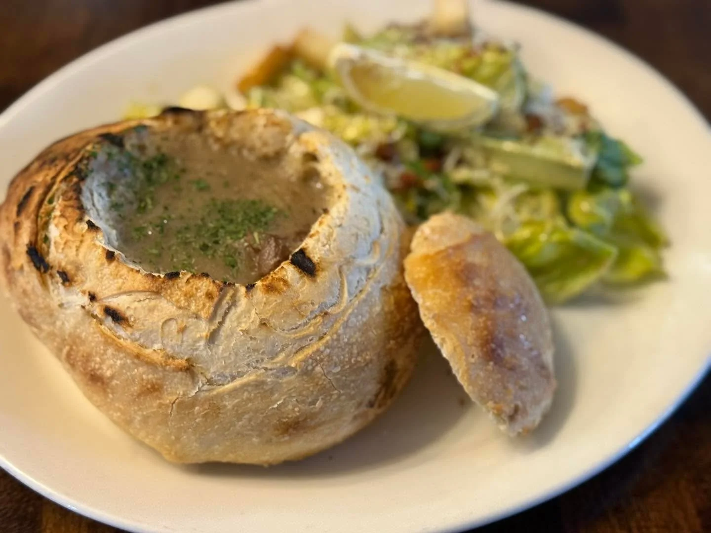 Hearty Bison Stew in a Sour dough bread bowl with Caesar salad! 

Served 11-2 pm. Today!