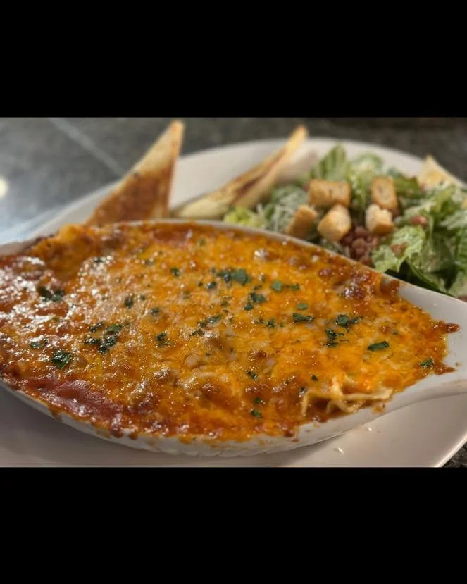 Baked Lasagna served with Caesar salad and Garlic toast! 

Perfect for another chilly day! 

Available 11-2 pm.