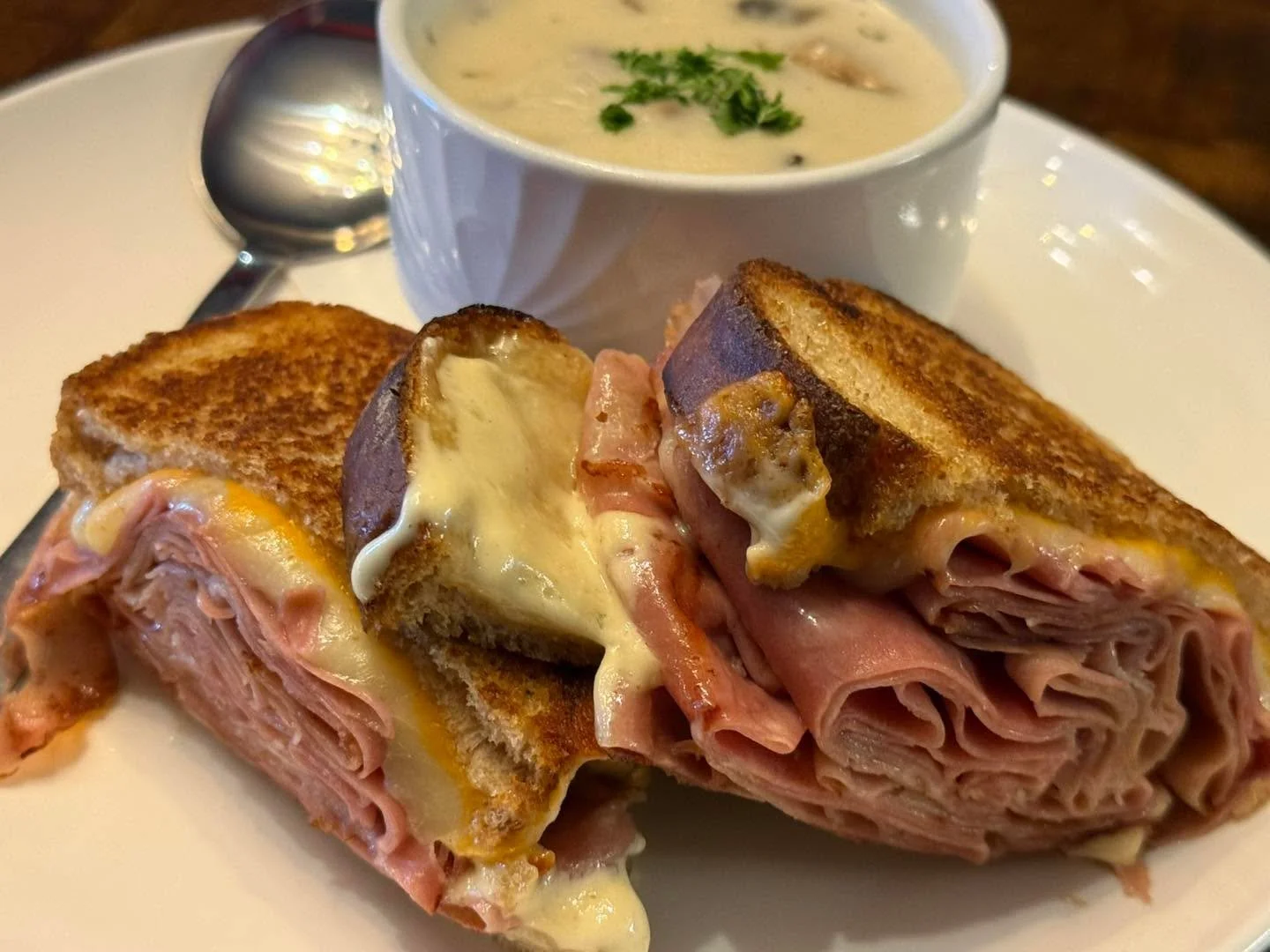 Three Cheese grilled cheese with Ham and Mortadella serve with Ed&rsquo;s own Cream of mushroom soup!  Served 11-2 pm today!!!