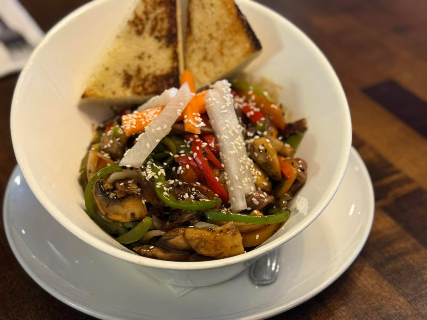 Bringing you our Certified Angus Teriyaki Beef Stir Fry for lunch.  Over Jasmine Rice with out pickled Daikon and Carrots and garnish.