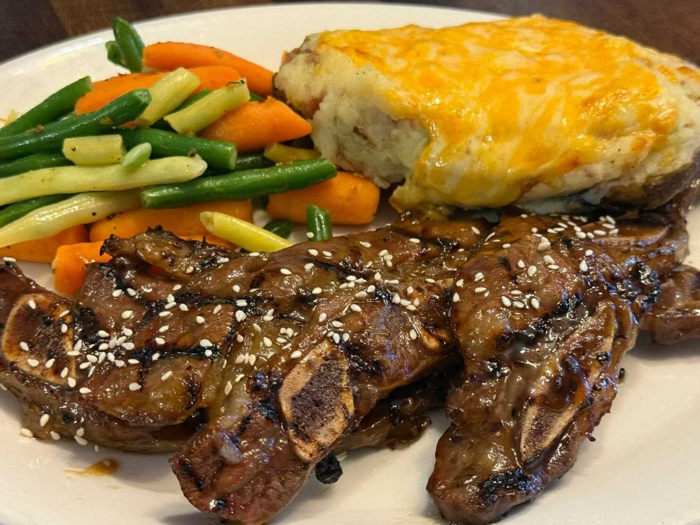 Marinated Beef Short Ribs with veggies and Stuffed Potato! 

Come Get Some!!