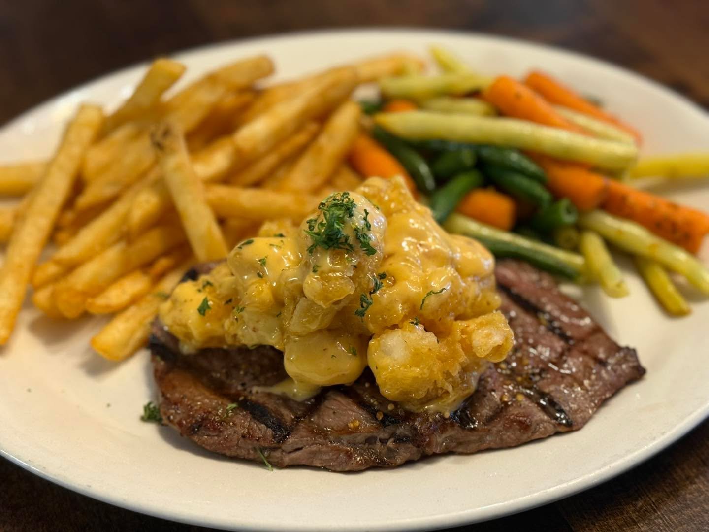 Surf and turf Luncheon at Coyotes!!! 

Steak with a pile of our BAM BAM shrimp! 

Come get Some!