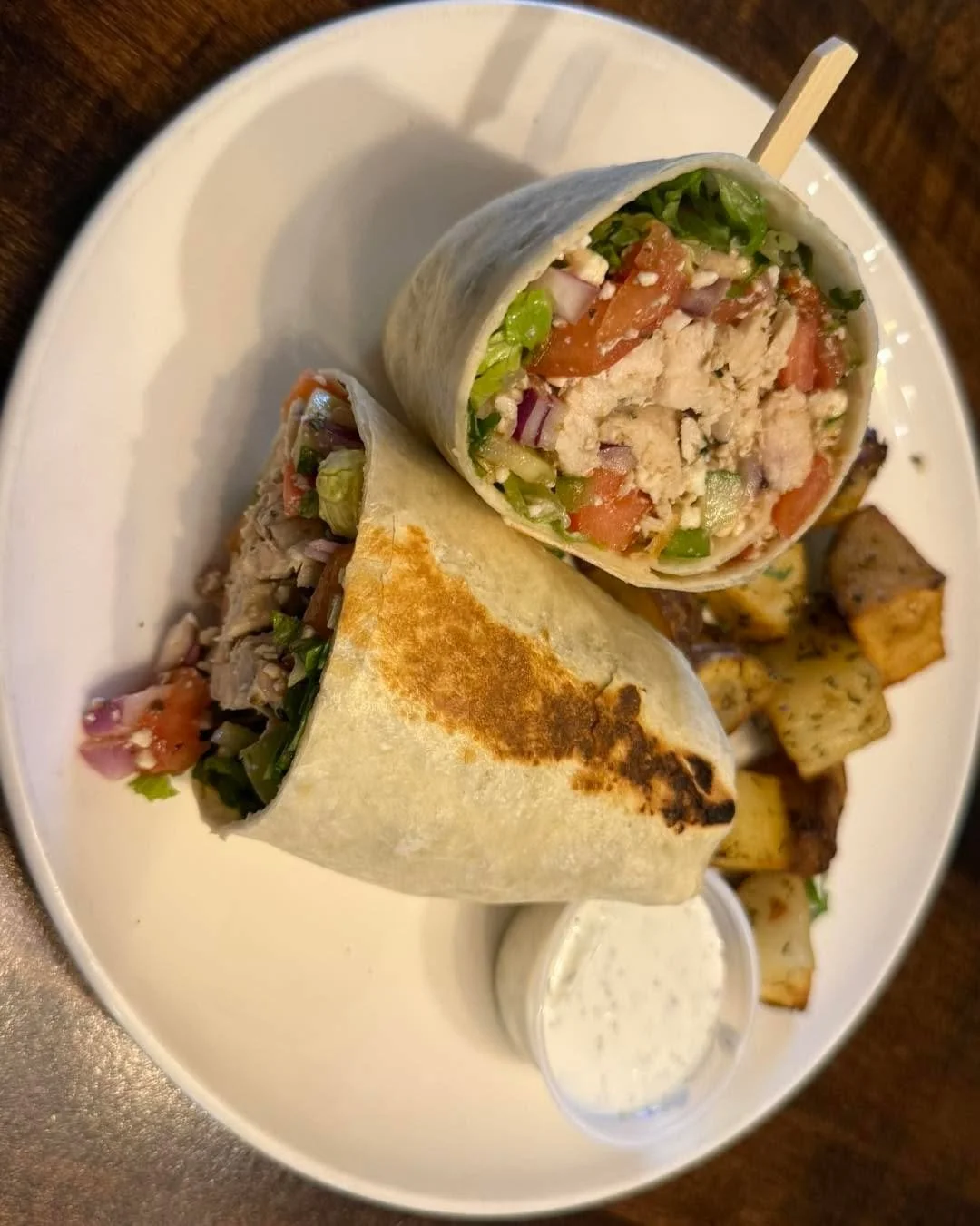 We have a beautiful Greek Chicken Wrap with herb roasted potatoes for Lunch!  Join us 11-2 pm.