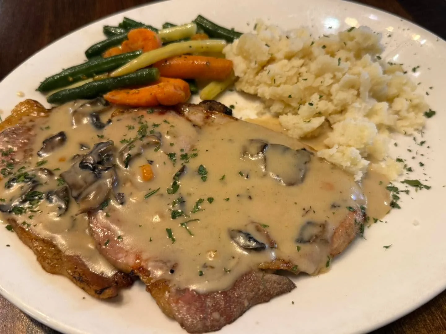 Charbroiled Pork chops with a mushroom gravy for lunch! 

Join us!