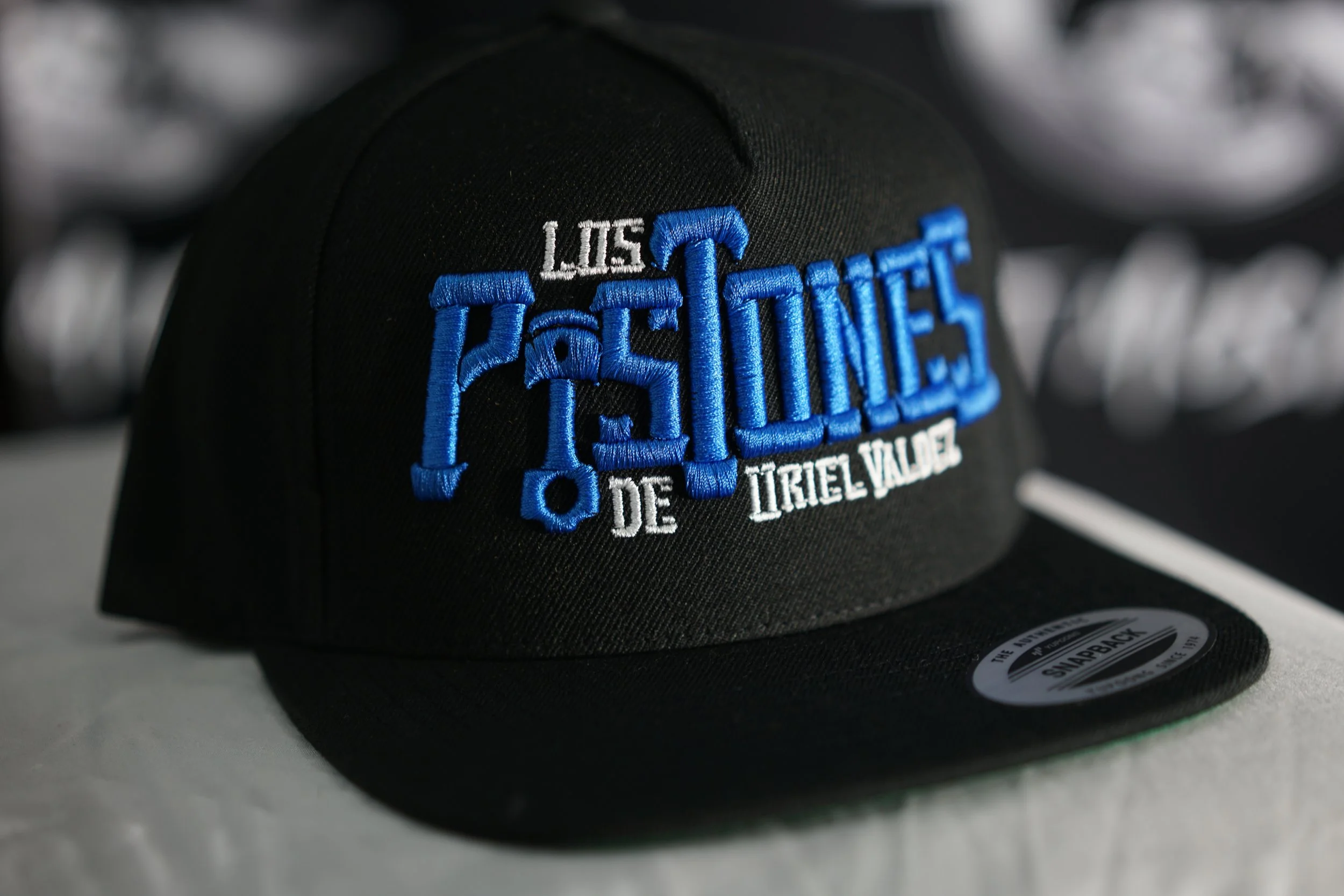 Los Pistones De Uriel Valdez Cap (Blue & Black).