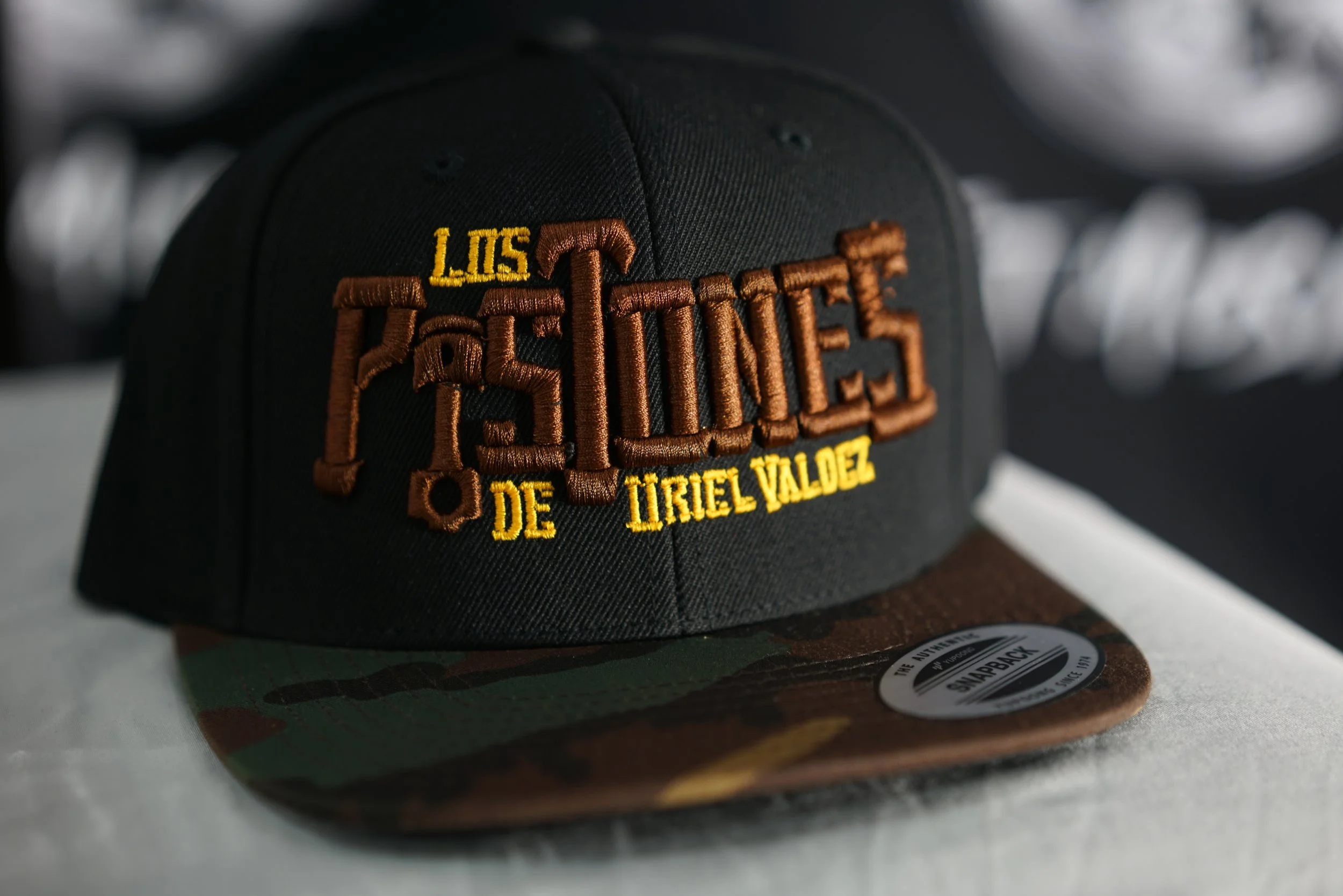Los Pistones De Uriel Valdez Cap (Black, Burgundy & Military)
