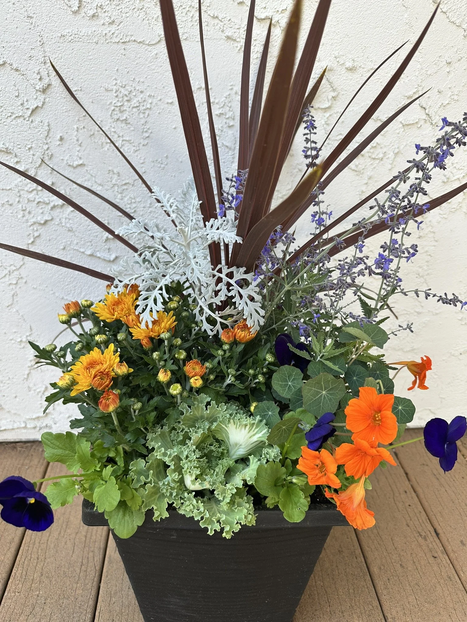 Create a fall planter for front door decor