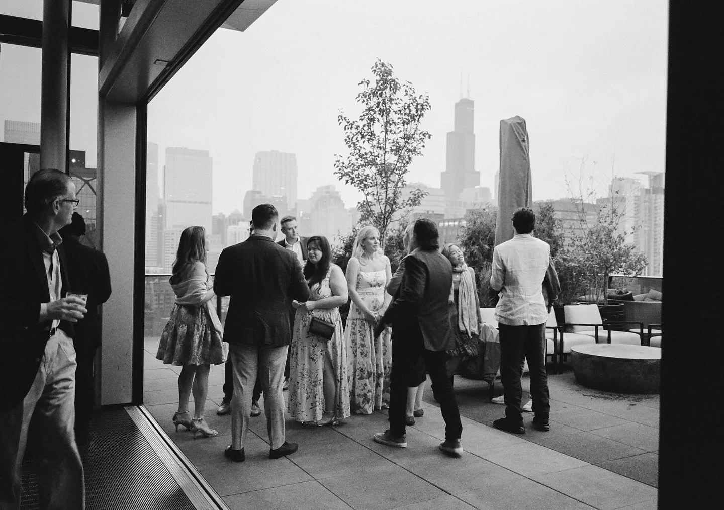 The first minute of a Chicago rooftop welcome party 🤍