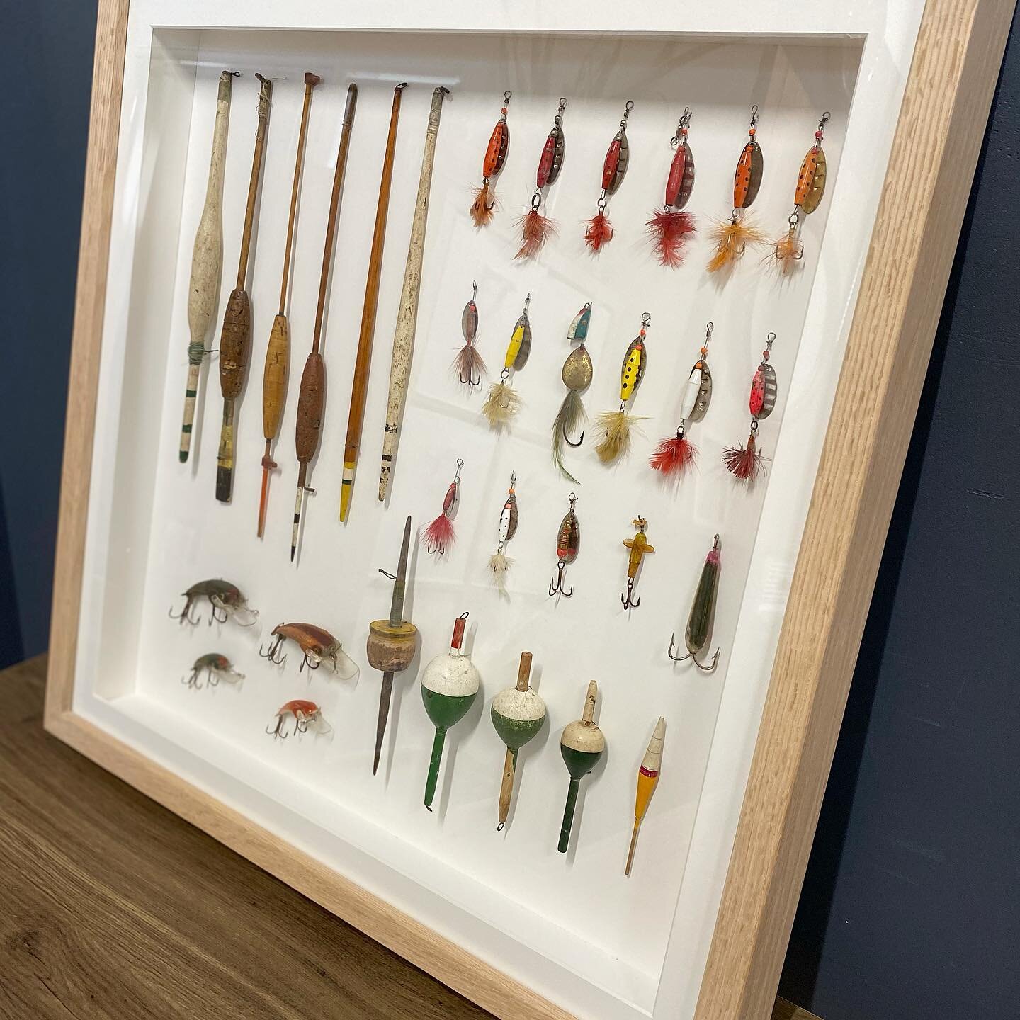 WE ARE BACK OPEN! 🎉😃⁣
⁣
It&rsquo;s been a MASSIVE week working through our orders. ⁣
⁣
We are open 10-3! ⁣

We framed these 32 old school fishing floats and lures for a client. 
Each one carefully attached so if need be they can be taken out withou