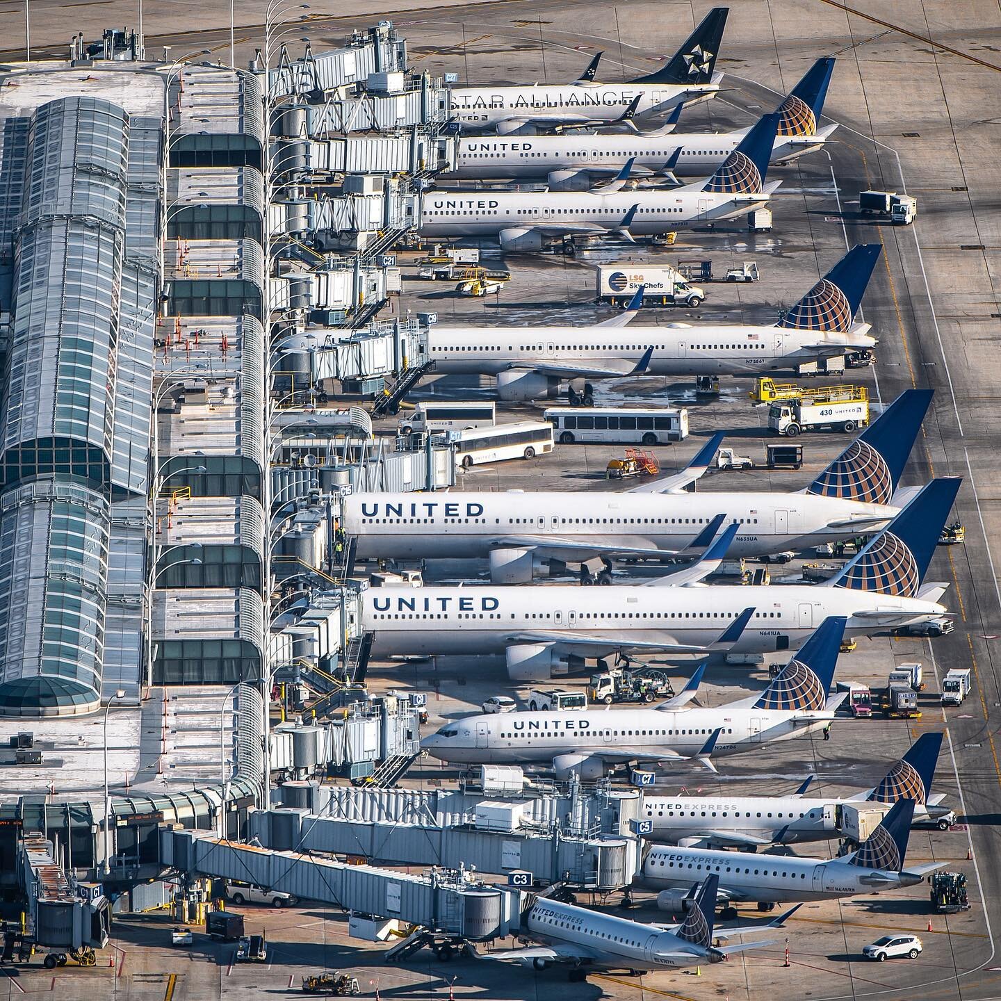 A morning lineup at United&rsquo;s terminal C before the morning departure bank.  #unitedairlines #767 #boeing #boeinglover #boeing767 #avgeek #instagramaviation #aviationlover #aviationphotography #nikon #nikonphotography #d850 #aerialphotography #n