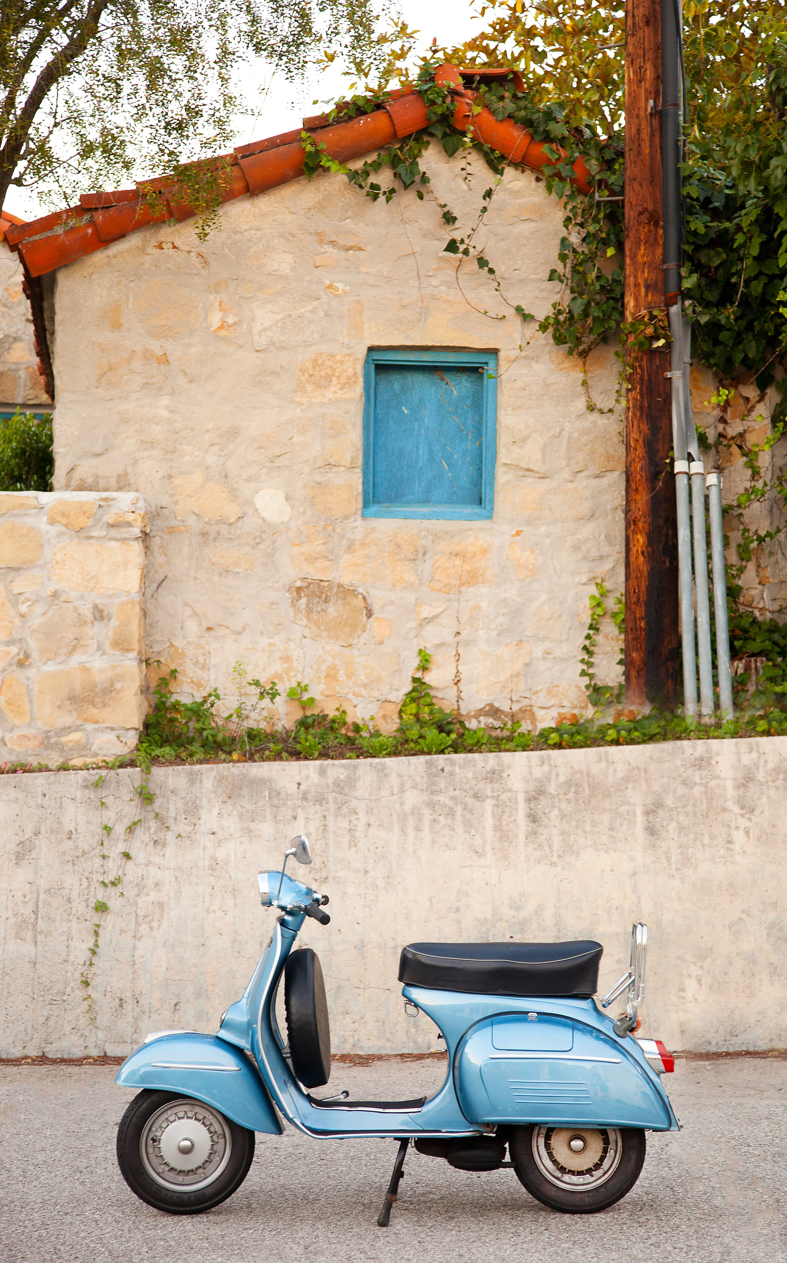 vintage cyan vespa 