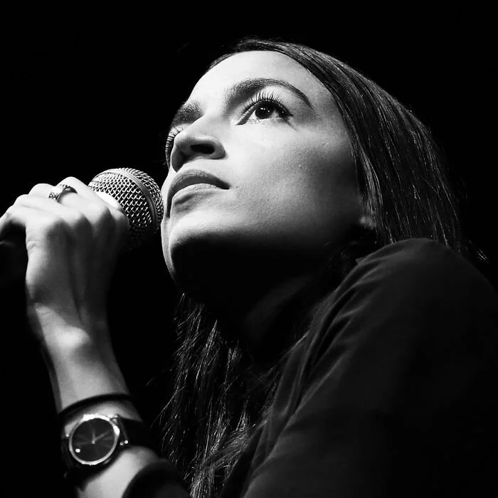dd569ff2786463e8cc76384937c80cea3b-19-alexandria-ocasio-cortez.rsquare.w700.jpg