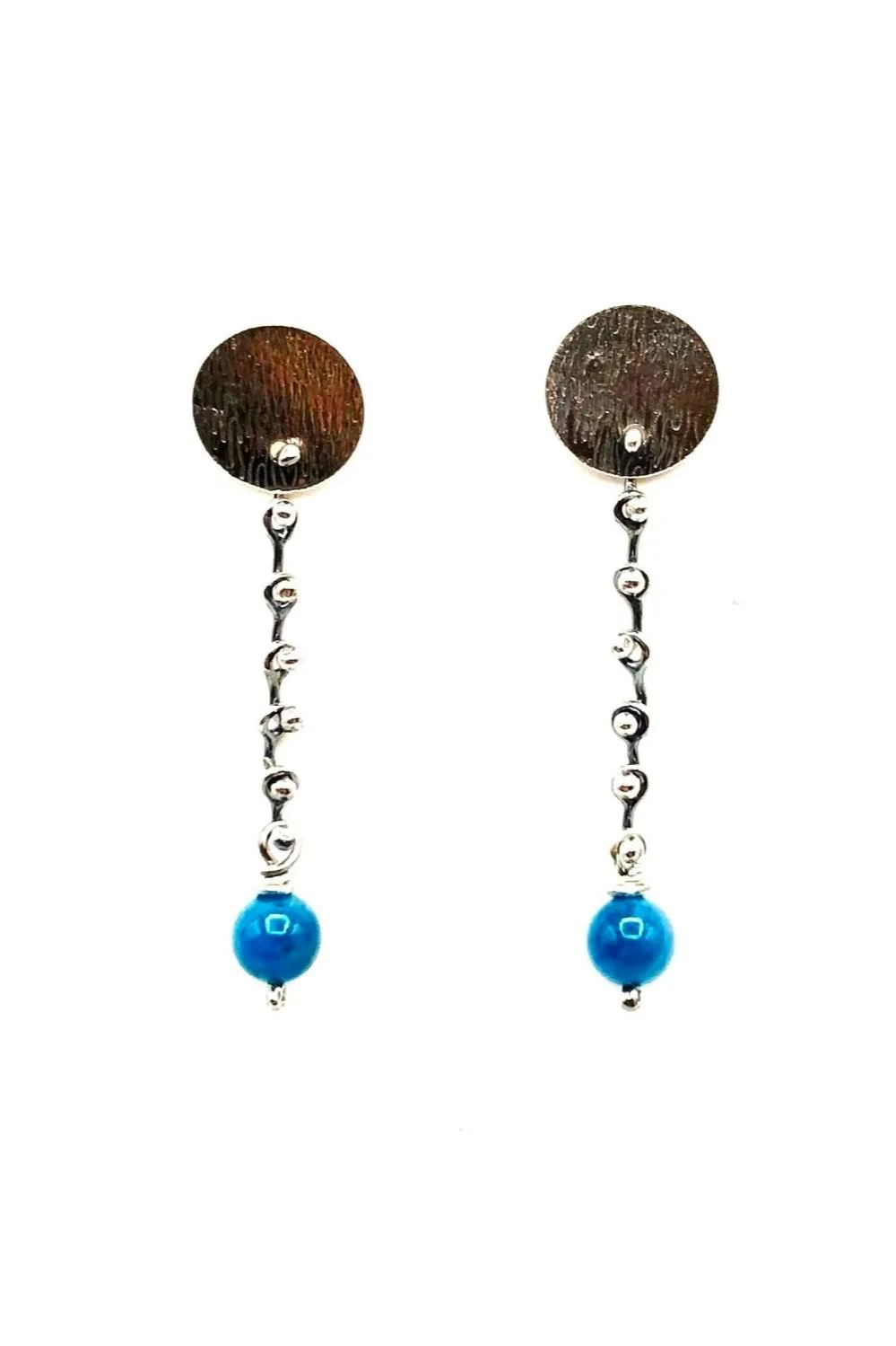 Sterling silver dangle earrings with blue apatite beads and hammered silver disc studs, named “Raindrop.”