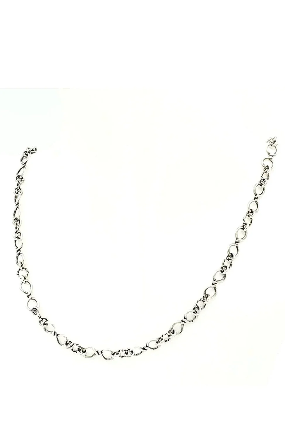 Handmade sterling silver chain with uniquely crafted, slightly twisted oval links forming an elegant, lightweight design.