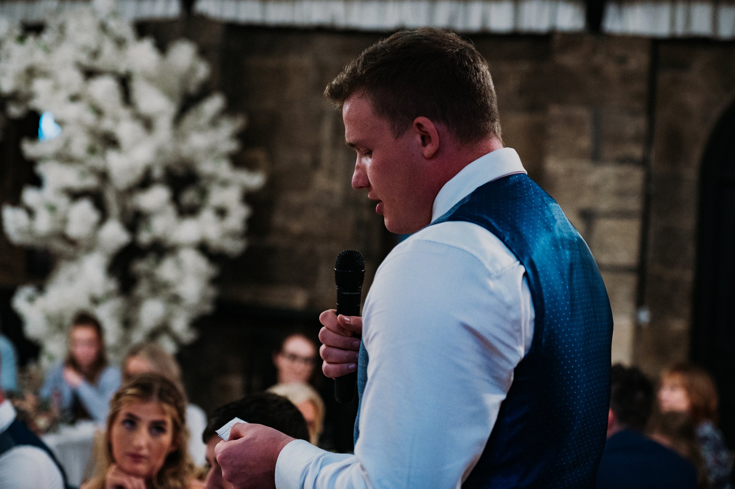 The groom's friend and second best man giving his speech after the meal at Sneaton Castle, Whitby.