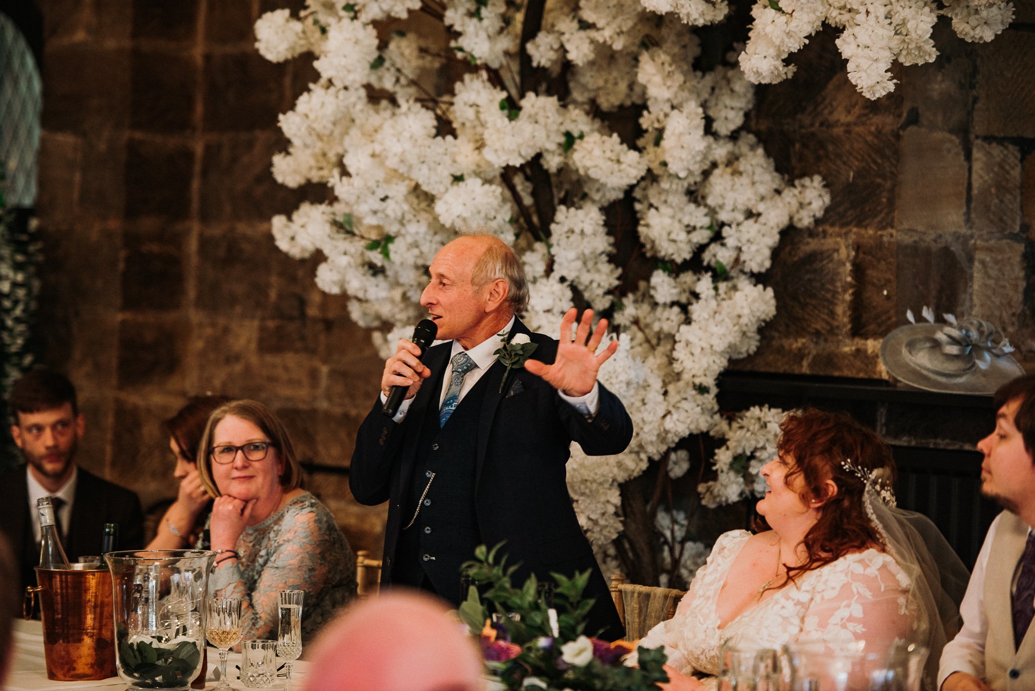 The father of the bride giving his speech to the wedding party after the meal at Sneaton Castle, Whitby.