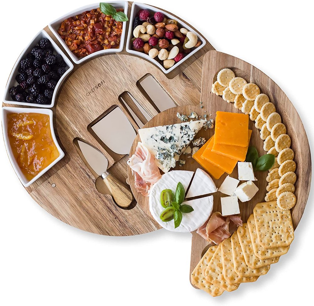 Perfect for the momma who loves to entertain! This acacia wood cheese board is a  COMPLETE set including 4 bowls and 4 knives to hold and slice all kinds of cheese types and charcuterie. Your parties won't be the same without it.