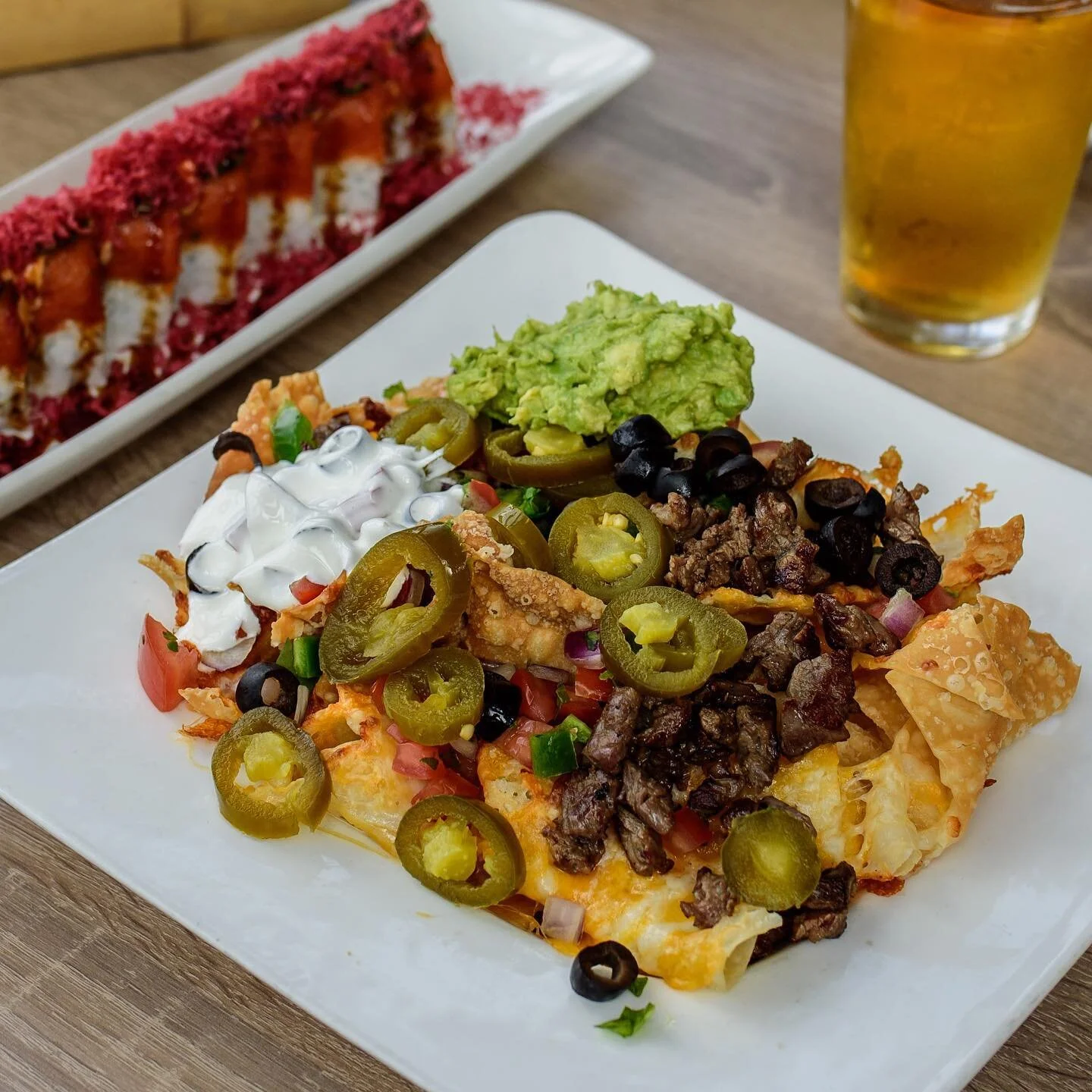 These are the days we live for; Sushi Friday is finally here #sushirockers - Come on in this weekend🤘🍣‼️ 

📷: Wonton Chip Nacho 
Wonton chips, sour cream, cheese, pickled jalape&ntilde;o, black olive, tomato salsa