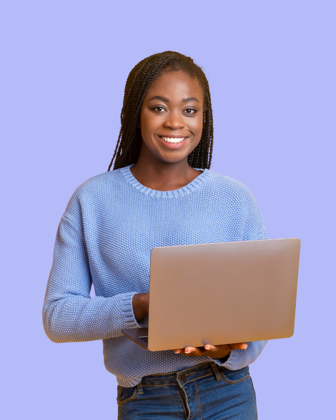 A young woman smiling while holding a silver laptop, wearing a light blue sweater, standing against a purple background.