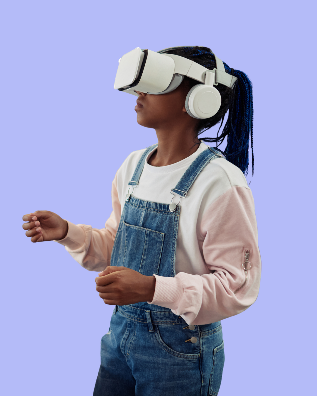A woman wearing a VR headset and headphones, dressed in a pink and white sweatshirt and denim overalls, against a purple background.