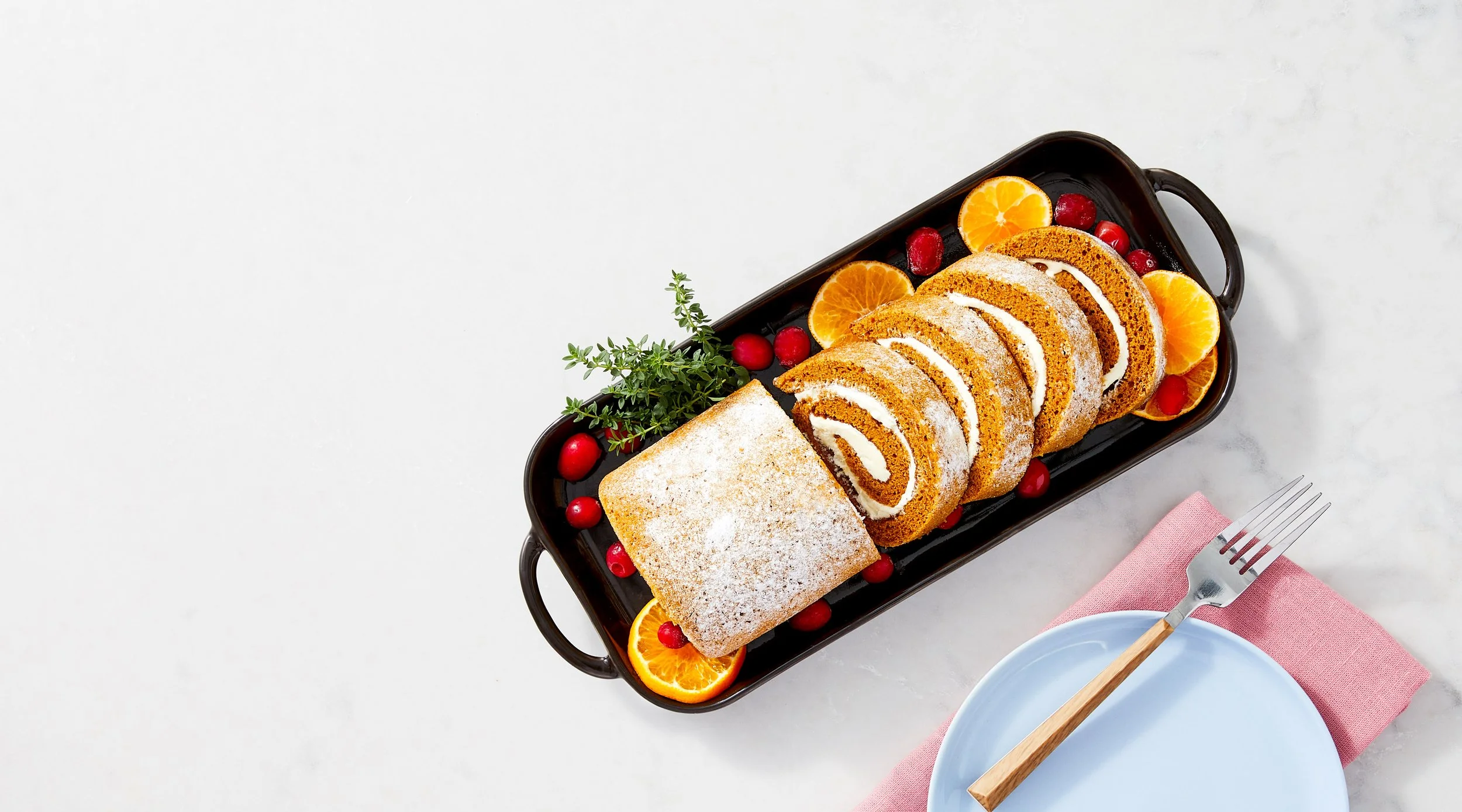 6706621-FY26-Q3-141-HOLIDAY-SeasonBakery-FOOD-Bakery-PumpkinRoll-Lifestyle-Prism-H.jpg