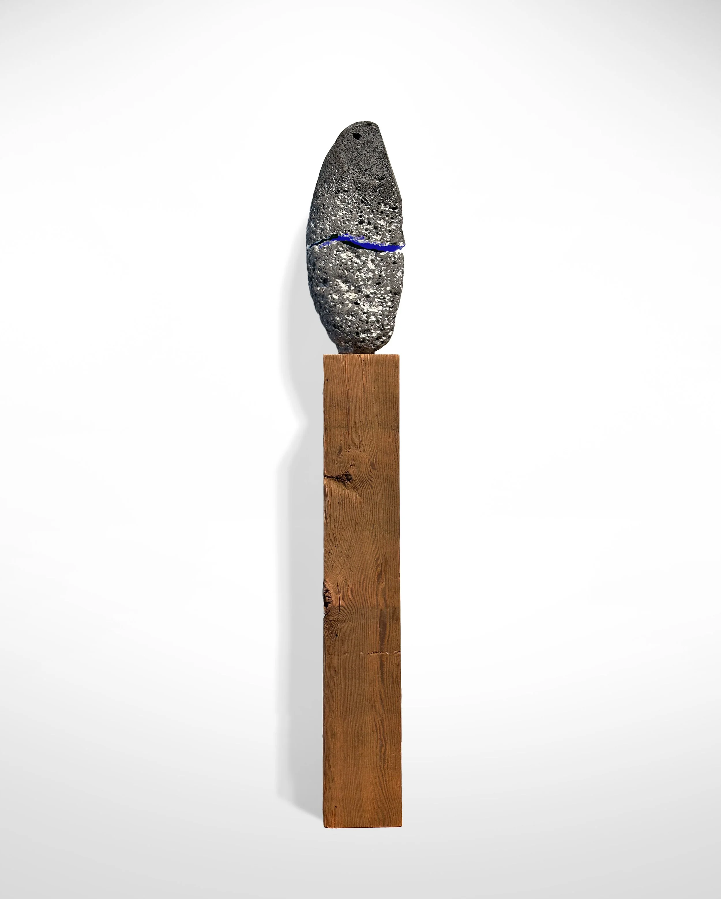 Mended Stone III, 7"x4"x38", basalt, indigo pigment, wood, $3000
