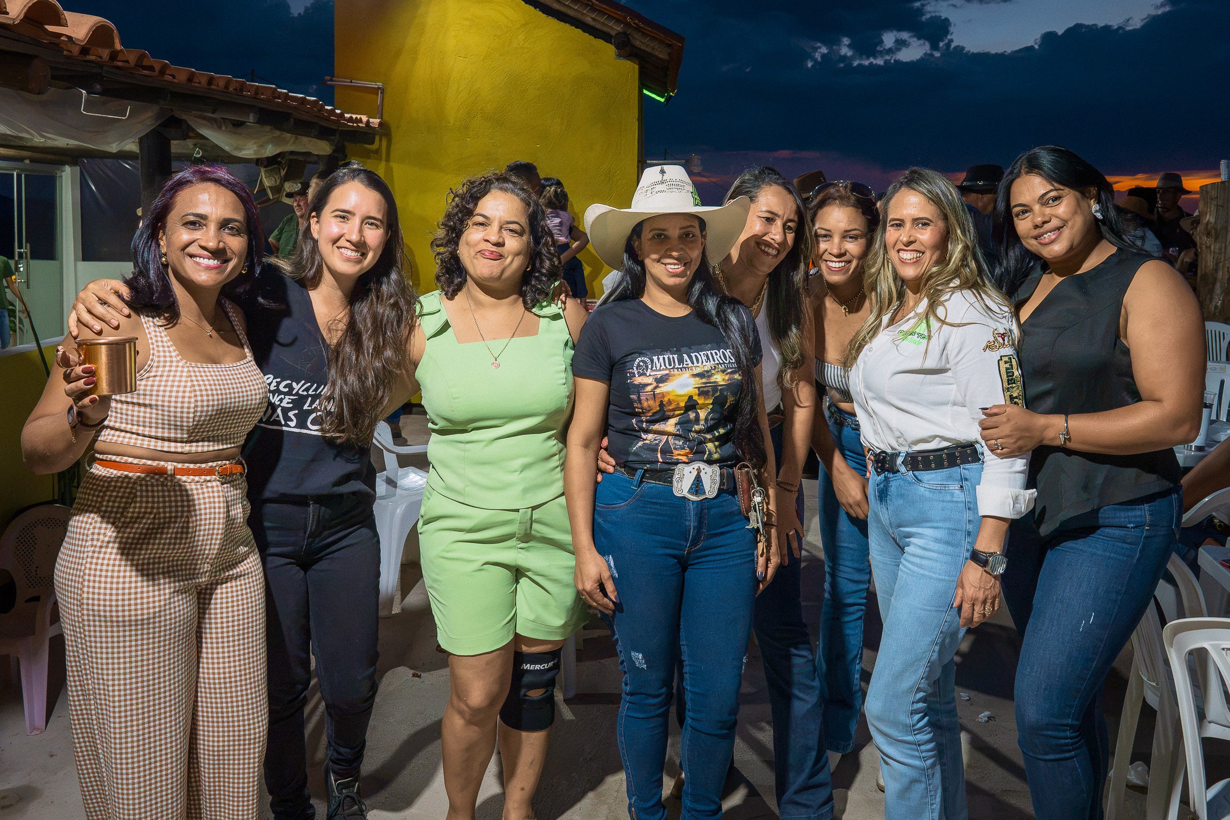 Elisa, second from left, poses with women from Santa Rita during Branquinho’s 50th birthday party near Guinda, Diamantina.